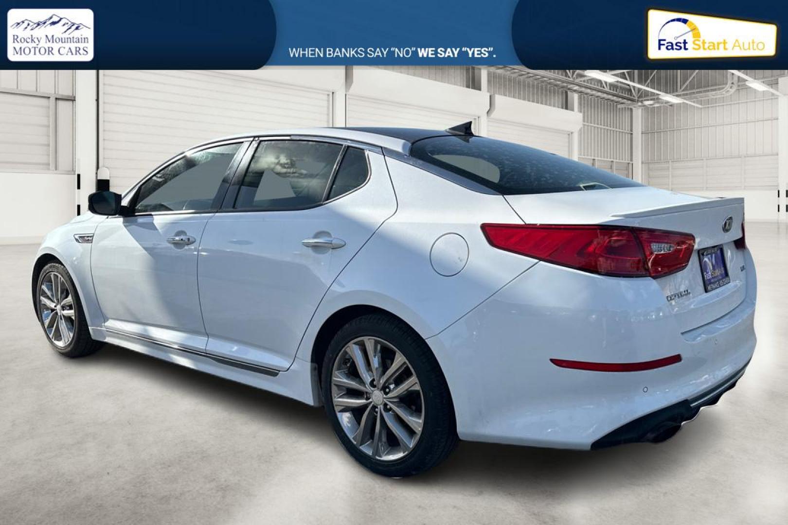 2015 White Kia Optima SX Turbo (5XXGR4A68FG) with an 2.0L L4 DOHC 16V TURBO engine, 6-Speed Automatic transmission, located at 344 S Washington Blvd, Ogden, UT, 84404, (801) 399-1799, 41.255482, -111.970848 - Photo#5