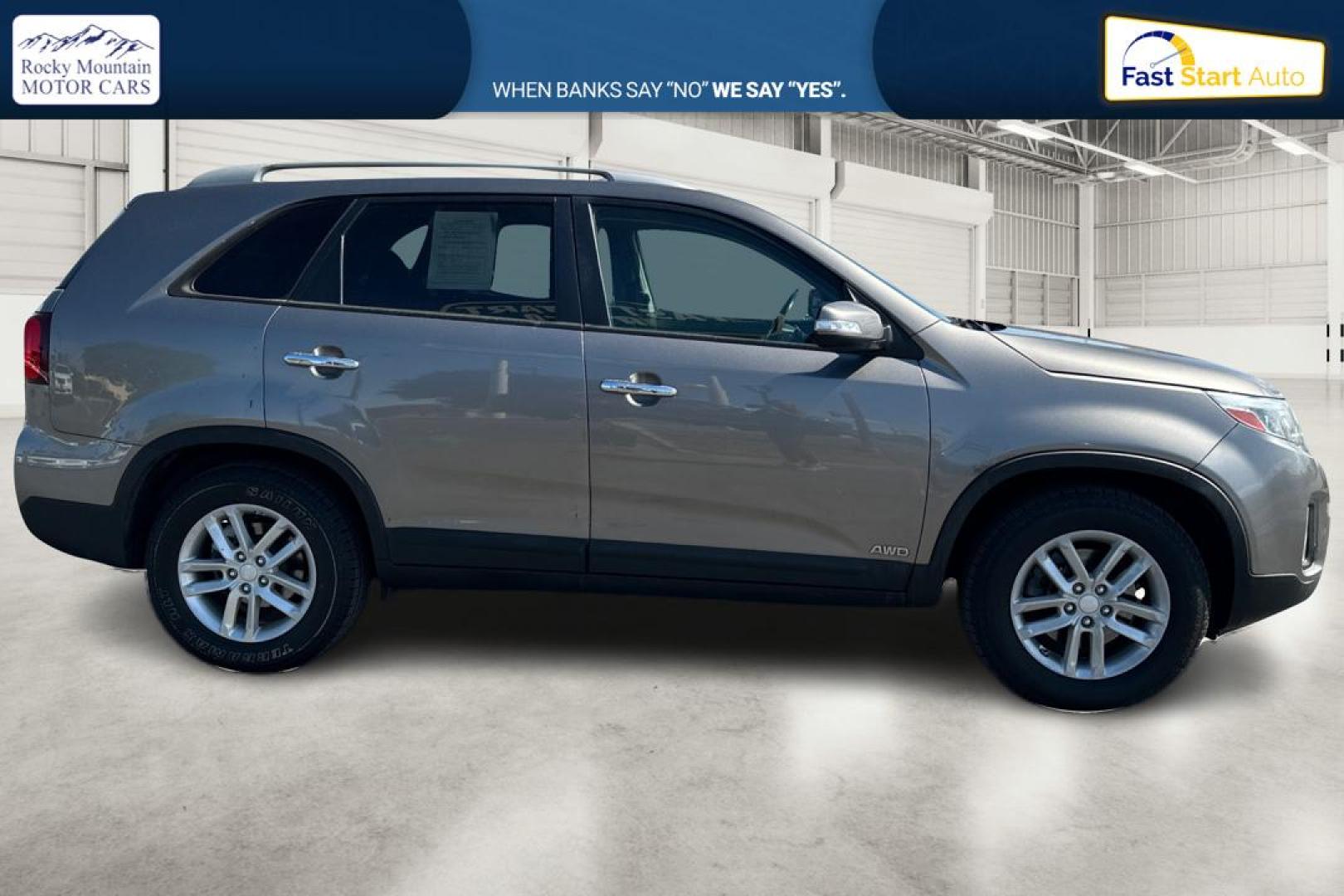 2015 Silver Kia Sorento LX AWD (5XYKTCA6XFG) with an 2.4L L4 DOHC 16V engine, 6-Speed Automatic transmission, located at 7755 State Street, Midvale, UT, 84047, (801) 753-9063, 40.610329, -111.890656 - Photo#1