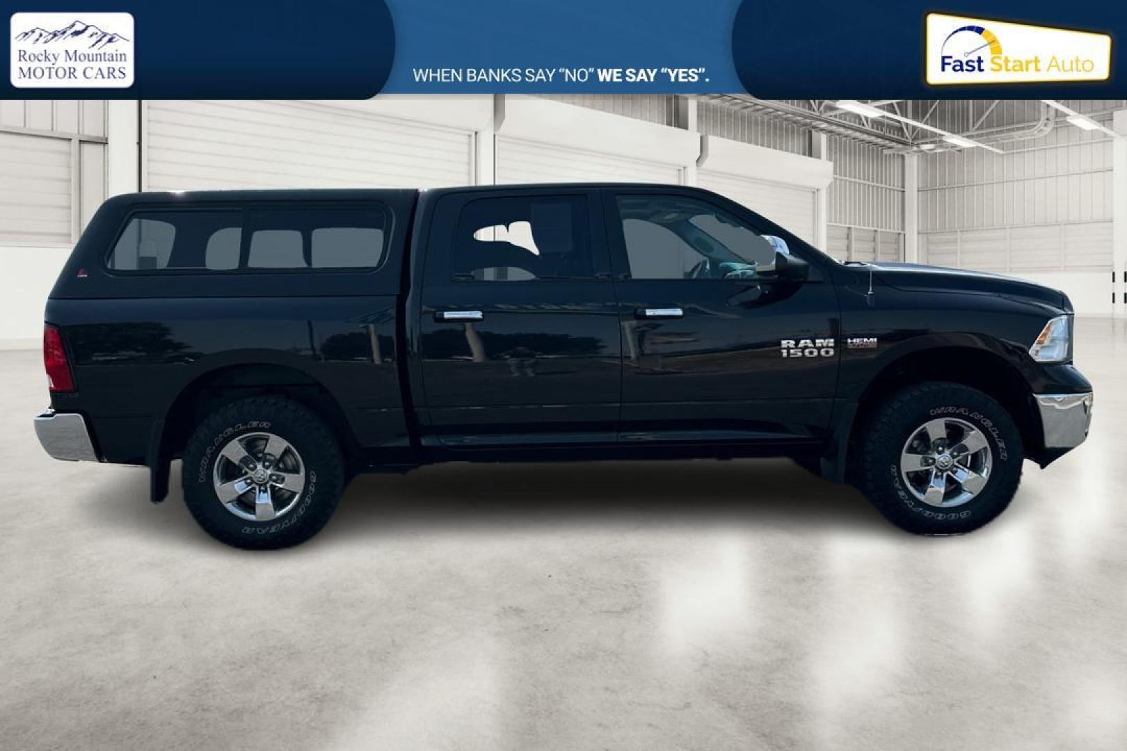 2015 Black RAM 1500 SLT Crew Cab SWB 4WD (1C6RR7LT3FS) with an 5.7L V8 OHV 16V engine, 6-Speed Automatic transmission, located at 7755 State Street, Midvale, UT, 84047, (801) 753-9063, 40.610329, -111.890656 - Photo#1