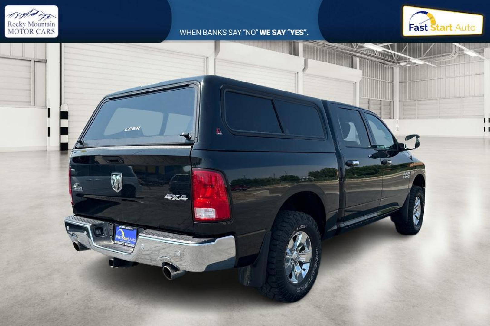 2015 Black RAM 1500 SLT Crew Cab SWB 4WD (1C6RR7LT3FS) with an 5.7L V8 OHV 16V engine, 6-Speed Automatic transmission, located at 7755 State Street, Midvale, UT, 84047, (801) 753-9063, 40.610329, -111.890656 - Photo#2
