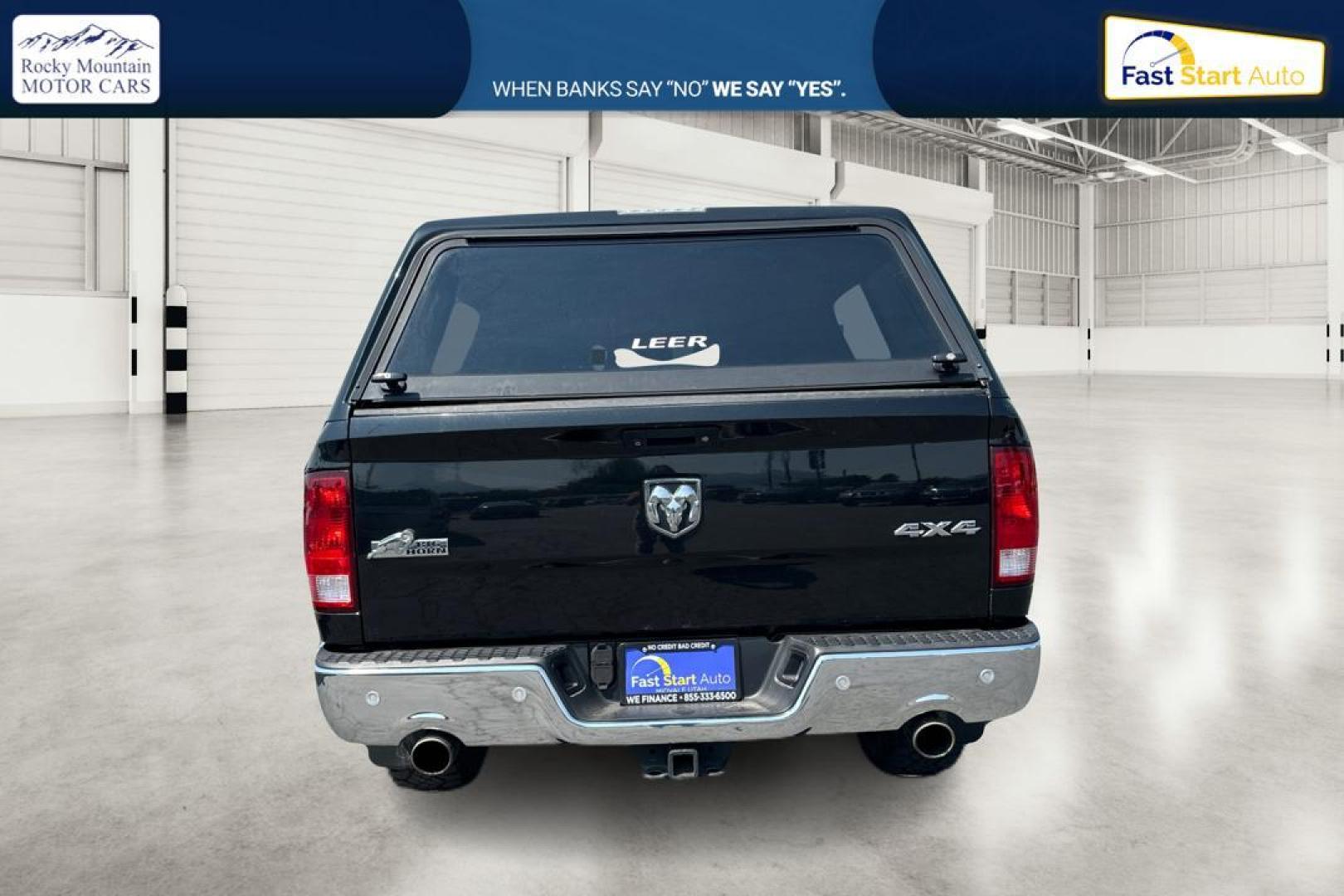 2015 Black RAM 1500 SLT Crew Cab SWB 4WD (1C6RR7LT3FS) with an 5.7L V8 OHV 16V engine, 6-Speed Automatic transmission, located at 7755 State Street, Midvale, UT, 84047, (801) 753-9063, 40.610329, -111.890656 - Photo#3