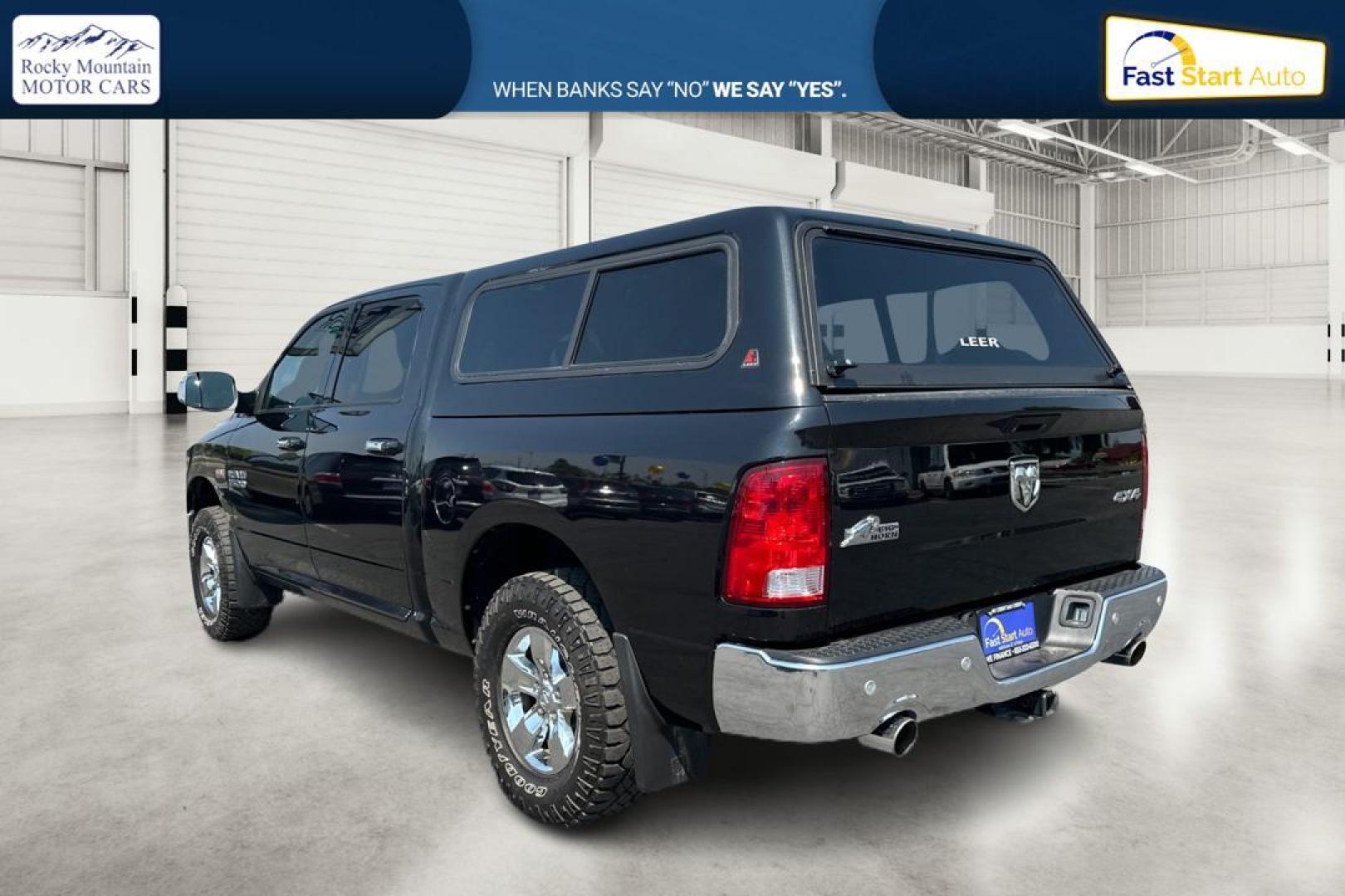 2015 Black RAM 1500 SLT Crew Cab SWB 4WD (1C6RR7LT3FS) with an 5.7L V8 OHV 16V engine, 6-Speed Automatic transmission, located at 7755 State Street, Midvale, UT, 84047, (801) 753-9063, 40.610329, -111.890656 - Photo#4