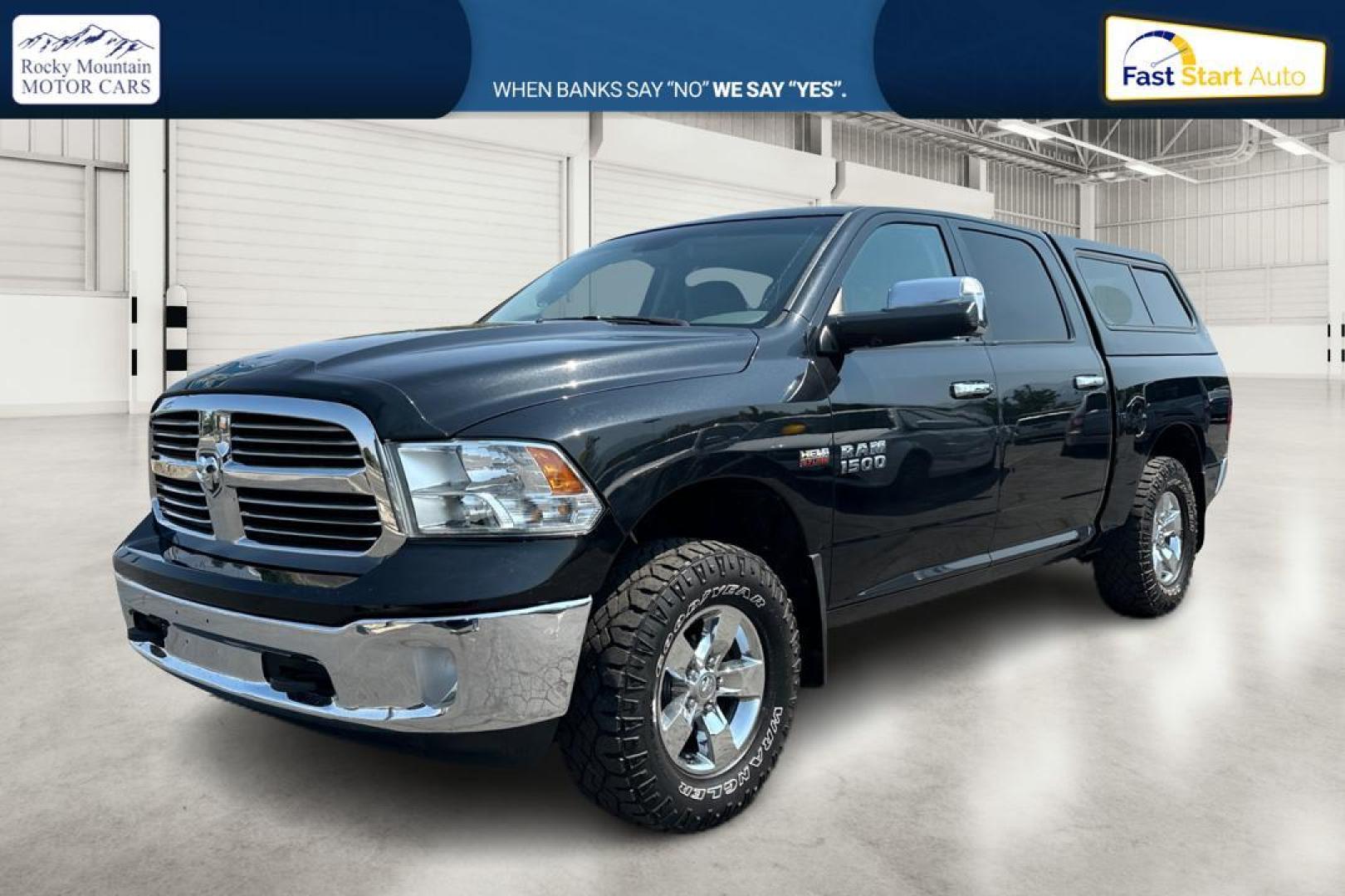 2015 Black RAM 1500 SLT Crew Cab SWB 4WD (1C6RR7LT3FS) with an 5.7L V8 OHV 16V engine, 6-Speed Automatic transmission, located at 7755 State Street, Midvale, UT, 84047, (801) 753-9063, 40.610329, -111.890656 - Photo#6