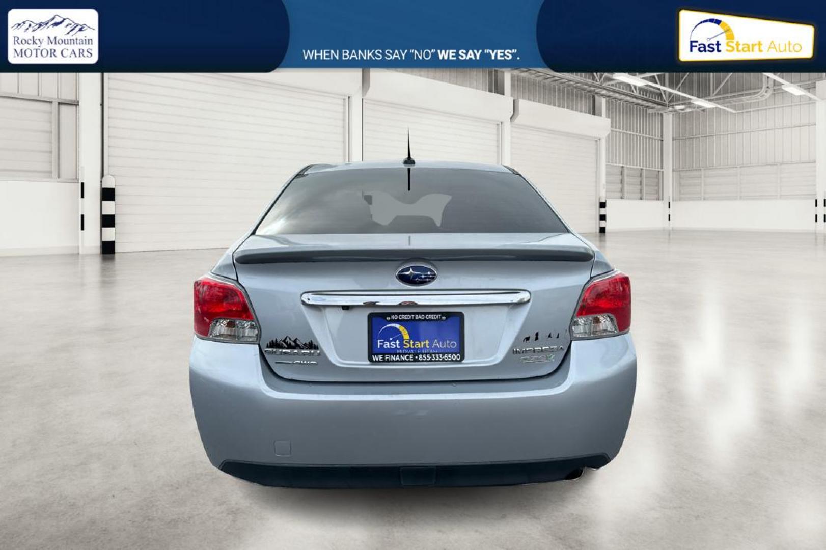 2015 Silver Subaru Impreza 2.0i Limited PZEV 4-Door (JF1GJAM63FH) with an 2.0L H4 DOHC 16V engine, Continuously Variable Transmission transmission, located at 344 S Washington Blvd, Ogden, UT, 84404, (801) 399-1799, 41.255482, -111.970848 - Photo#4