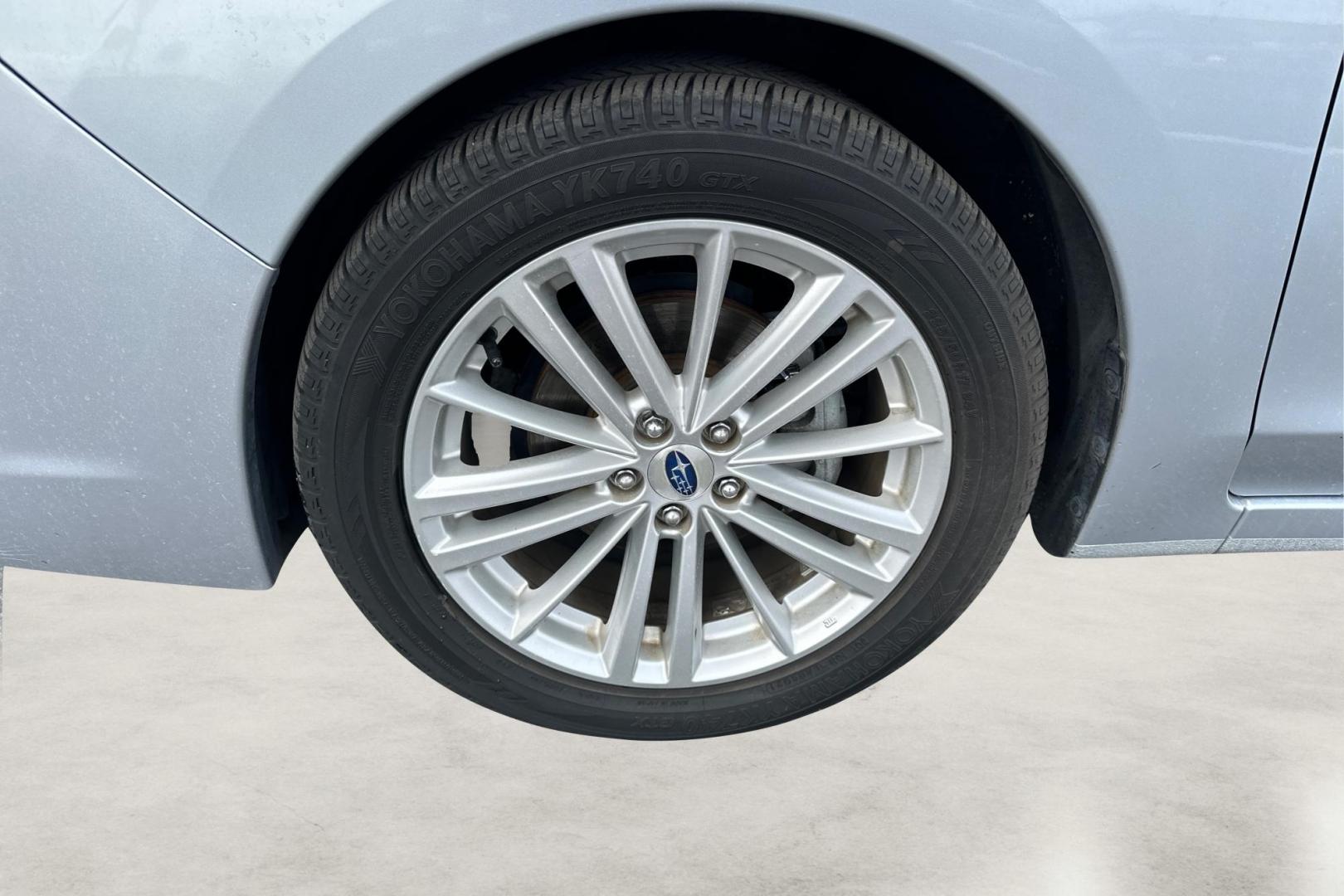 2015 Silver Subaru Impreza 2.0i Limited PZEV 4-Door (JF1GJAM63FH) with an 2.0L H4 DOHC 16V engine, Continuously Variable Transmission transmission, located at 344 S Washington Blvd, Ogden, UT, 84404, (801) 399-1799, 41.255482, -111.970848 - Photo#12