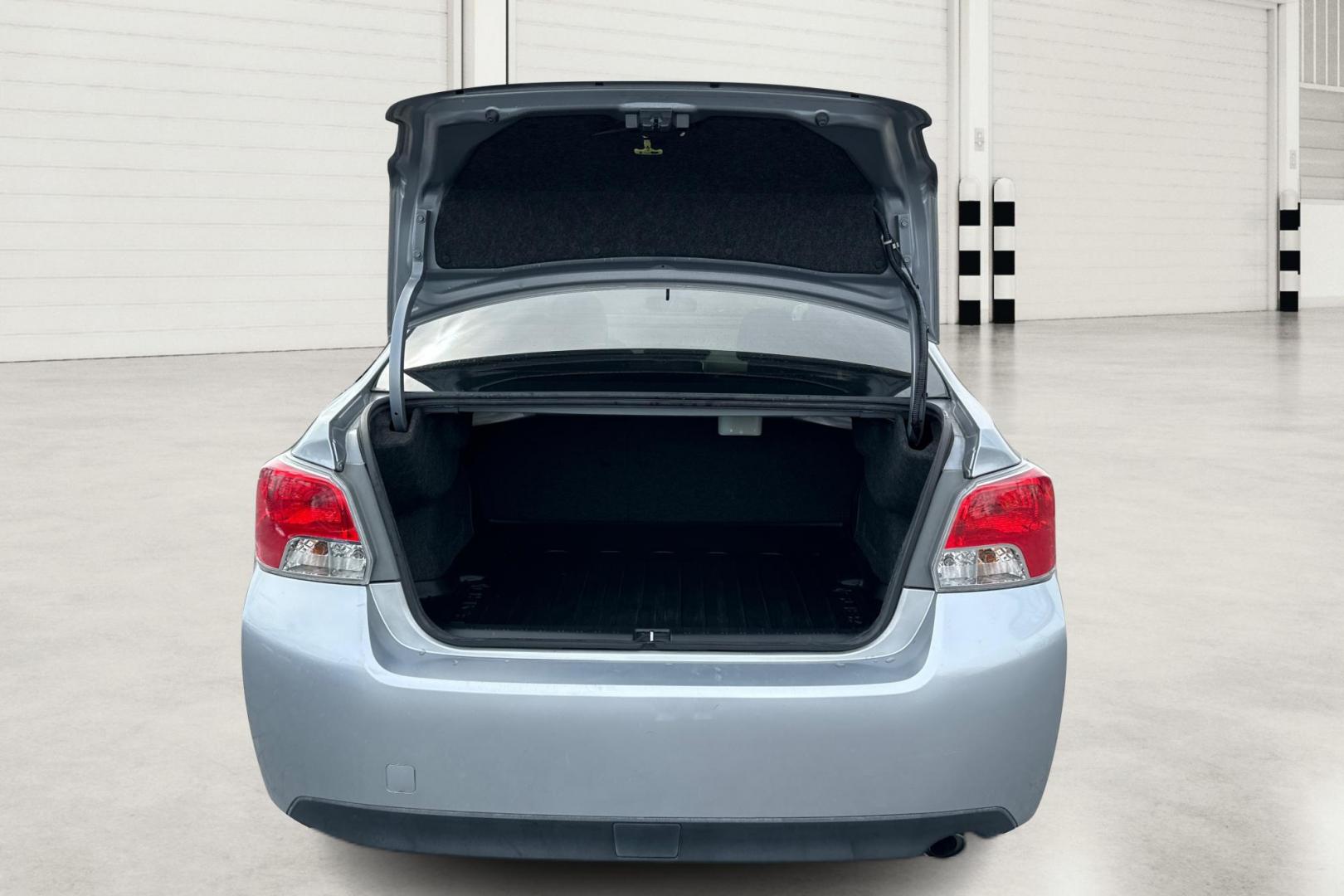 2015 Silver Subaru Impreza 2.0i Limited PZEV 4-Door (JF1GJAM63FH) with an 2.0L H4 DOHC 16V engine, Continuously Variable Transmission transmission, located at 344 S Washington Blvd, Ogden, UT, 84404, (801) 399-1799, 41.255482, -111.970848 - Photo#13