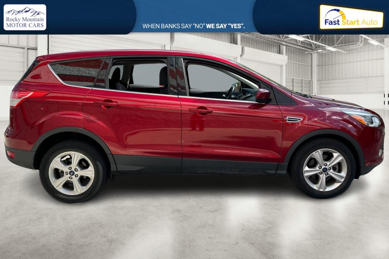 2016 Red Ford Escape SE FWD (1FMCU0G79GU) with an 2.5L L4 DOHC 16V engine, 6-Speed Automatic transmission, located at 767 S State Road, Pleasant Grove, UT, 84062, (801) 785-1058, 40.354839, -111.736687 - Photo#1
