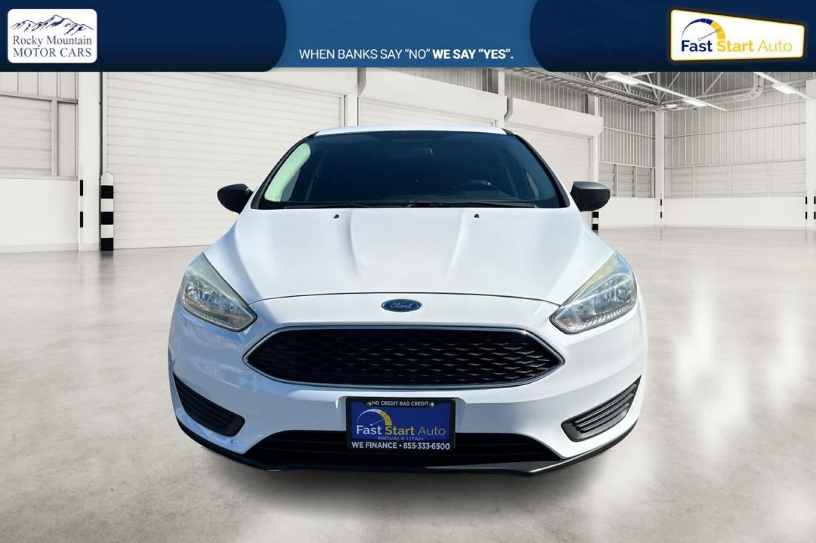 2016 White Ford Focus S Sedan (1FADP3E26GL) with an 2.0L L4 DOHC 16V engine, 5M transmission, located at 7755 State Street, Midvale, UT, 84047, (801) 753-9063, 40.610329, -111.890656 - Photo#7