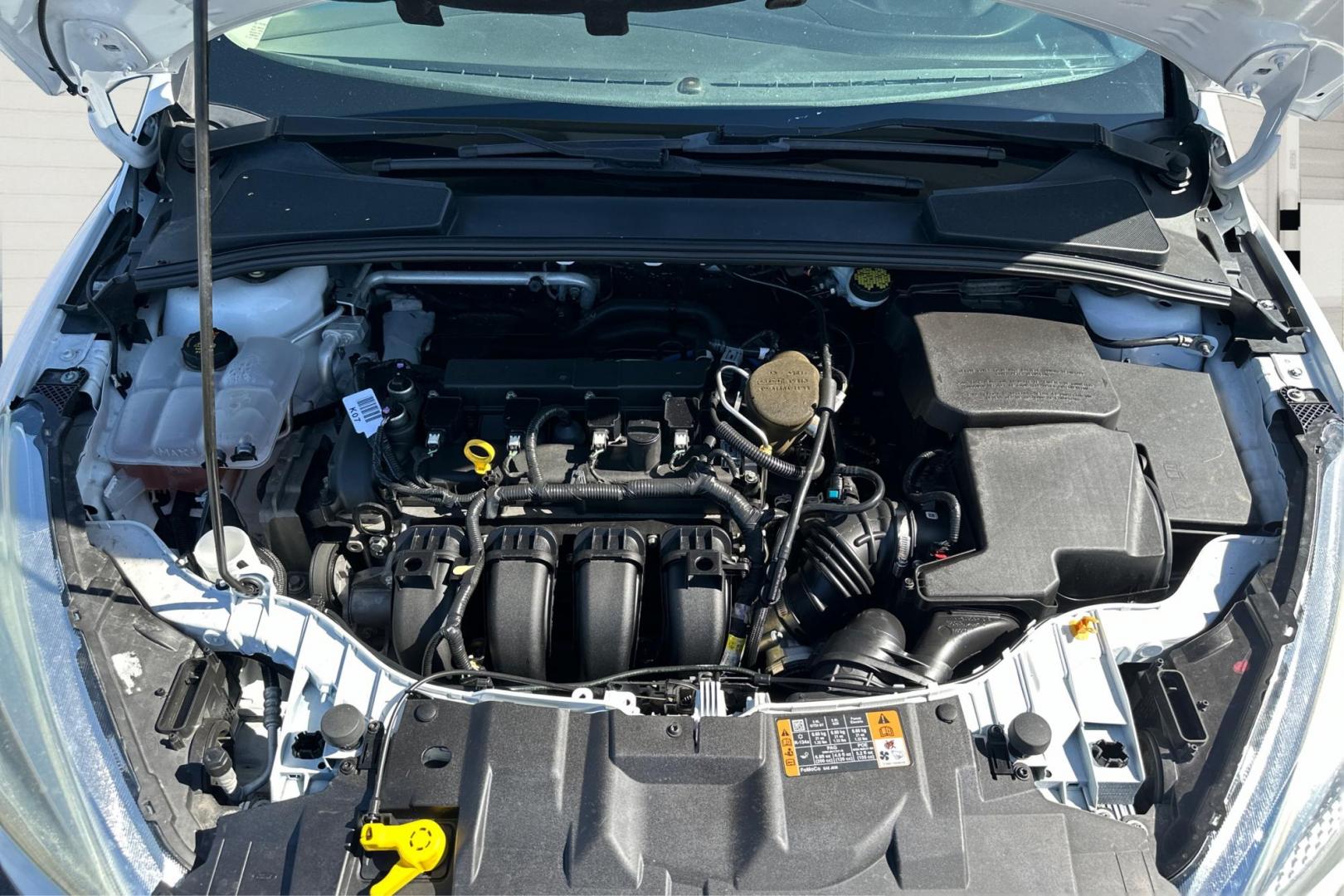 2016 White Ford Focus S Sedan (1FADP3E26GL) with an 2.0L L4 DOHC 16V engine, 5M transmission, located at 7755 State Street, Midvale, UT, 84047, (801) 753-9063, 40.610329, -111.890656 - Photo#8