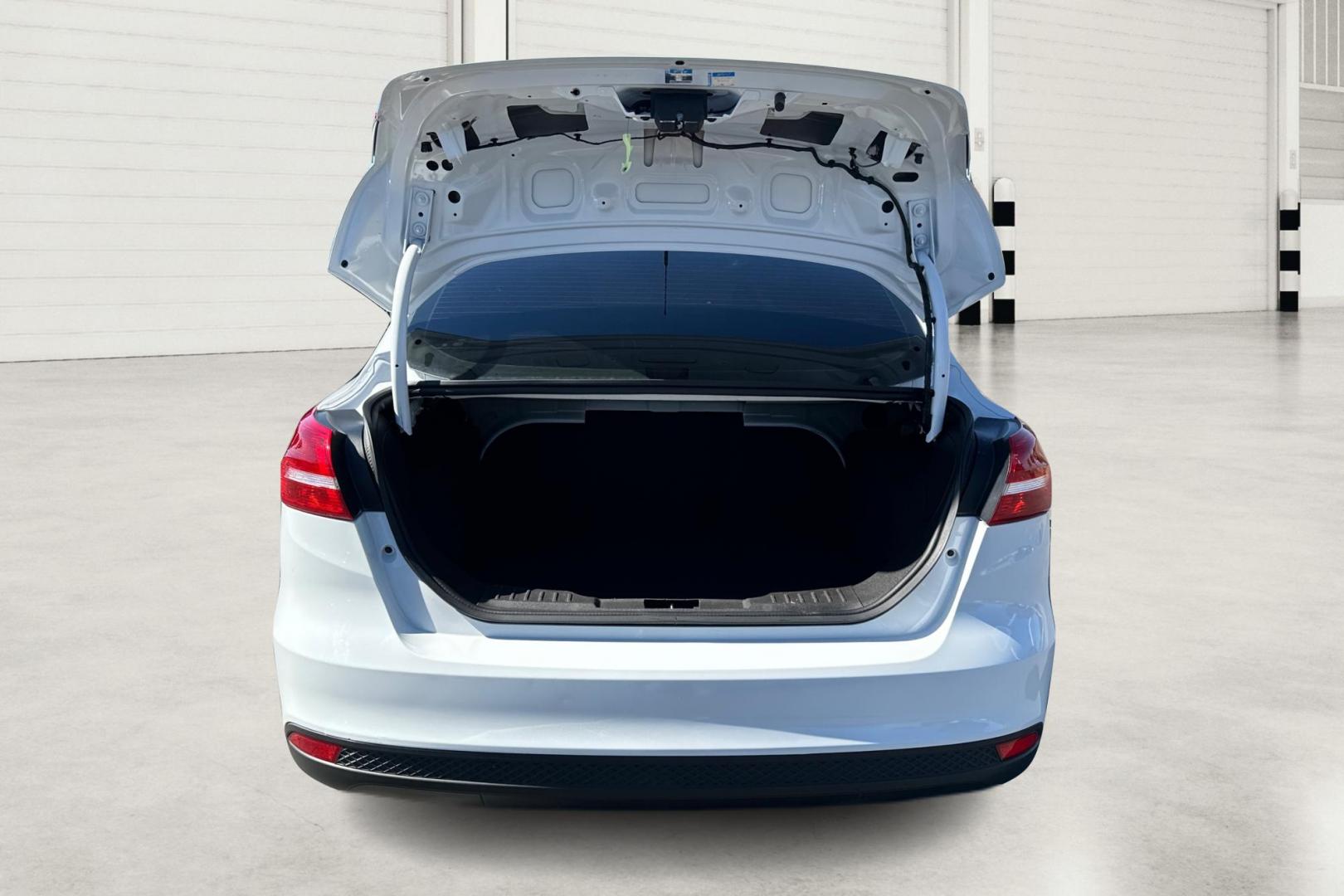 2016 White Ford Focus S Sedan (1FADP3E26GL) with an 2.0L L4 DOHC 16V engine, 5M transmission, located at 7755 State Street, Midvale, UT, 84047, (801) 753-9063, 40.610329, -111.890656 - Photo#10