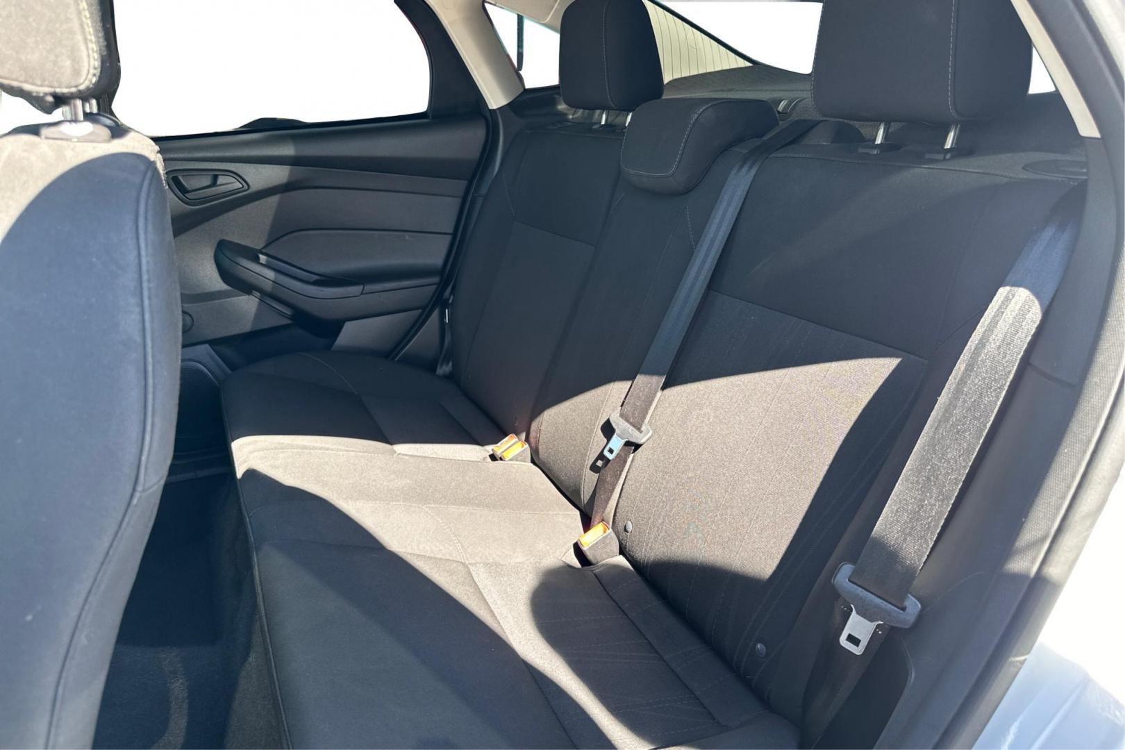 2016 White Ford Focus S Sedan (1FADP3E26GL) with an 2.0L L4 DOHC 16V engine, 5M transmission, located at 7755 State Street, Midvale, UT, 84047, (801) 753-9063, 40.610329, -111.890656 - Photo#12