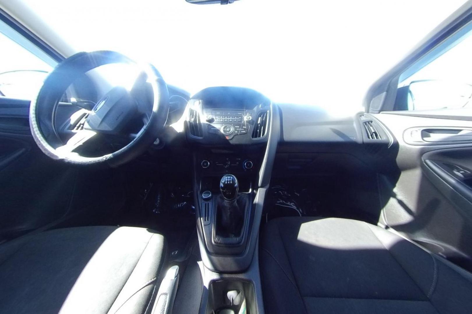 2016 White Ford Focus S Sedan (1FADP3E26GL) with an 2.0L L4 DOHC 16V engine, 5M transmission, located at 7755 State Street, Midvale, UT, 84047, (801) 753-9063, 40.610329, -111.890656 - Photo#13