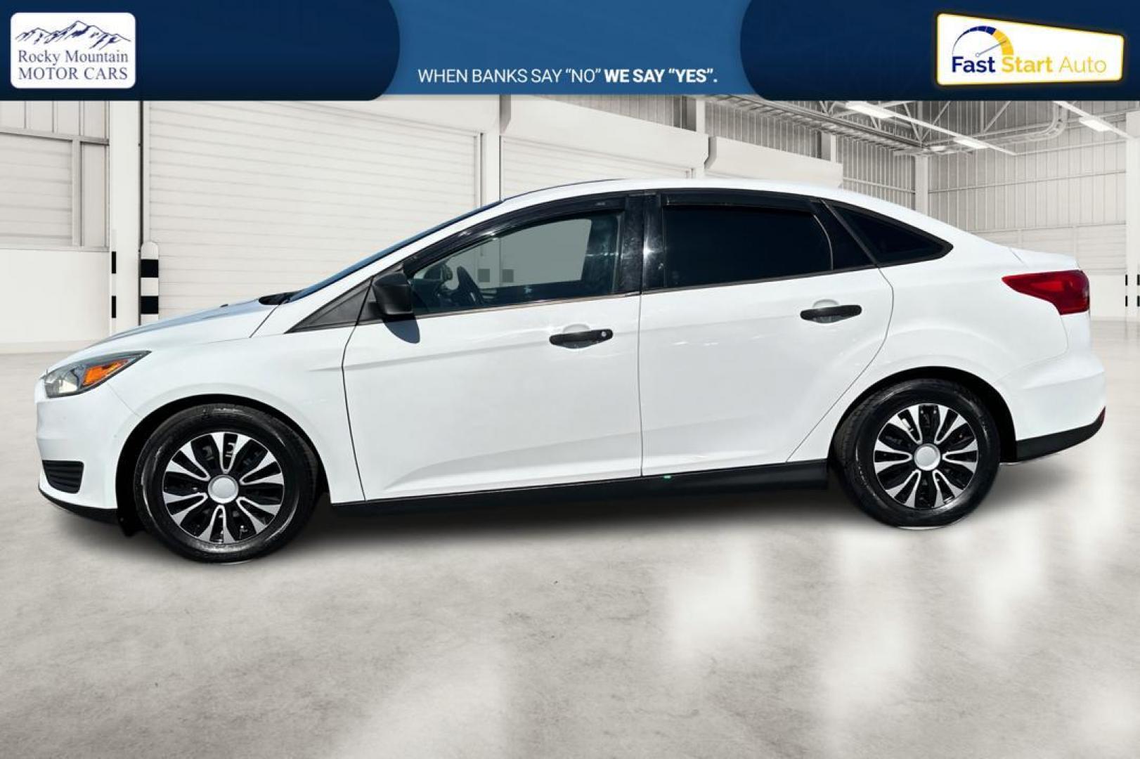2016 White Ford Focus S Sedan (1FADP3E26GL) with an 2.0L L4 DOHC 16V engine, 5M transmission, located at 7755 State Street, Midvale, UT, 84047, (801) 753-9063, 40.610329, -111.890656 - Photo#5