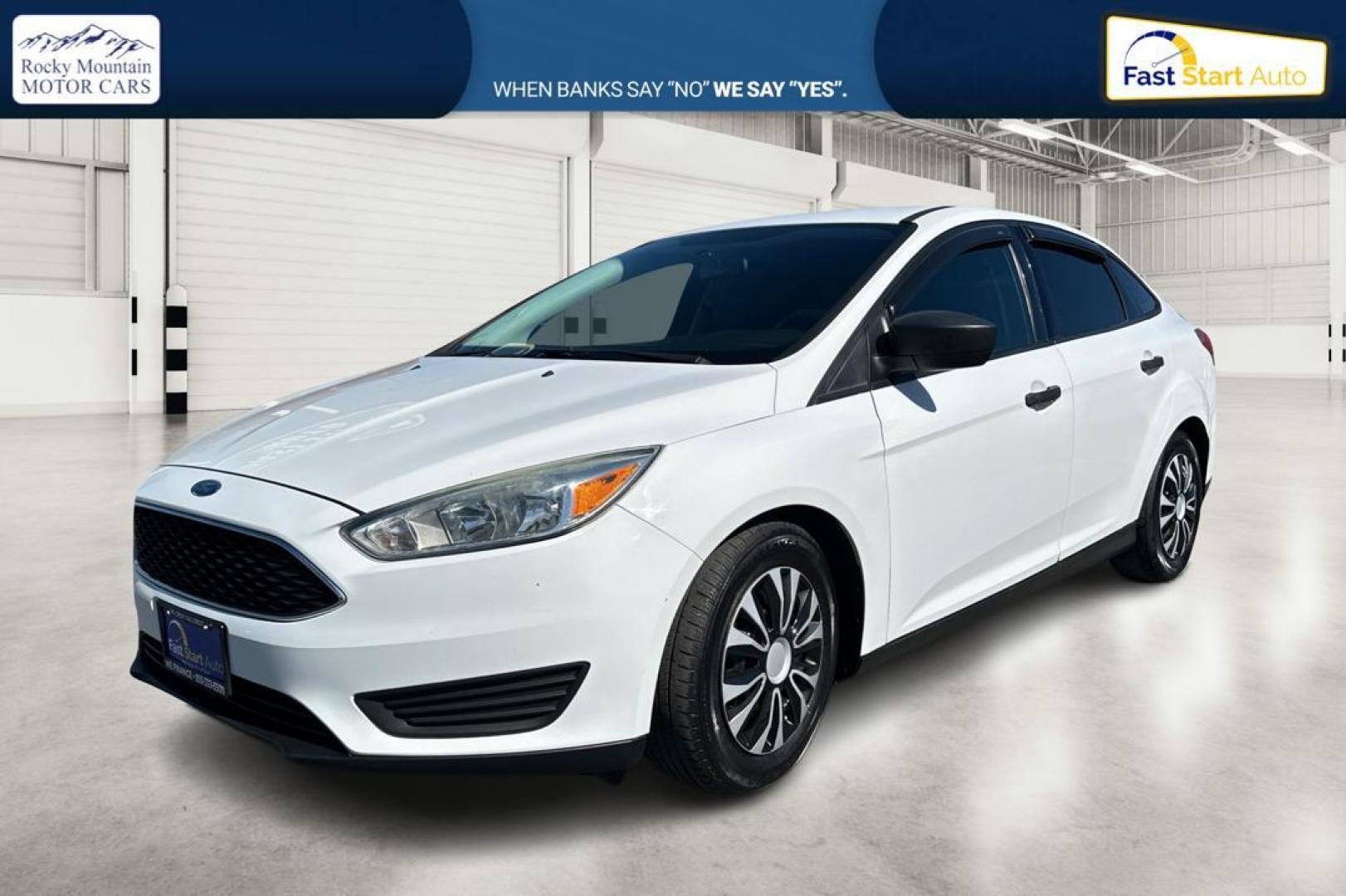 2016 White Ford Focus S Sedan (1FADP3E26GL) with an 2.0L L4 DOHC 16V engine, 5M transmission, located at 7755 State Street, Midvale, UT, 84047, (801) 753-9063, 40.610329, -111.890656 - Photo#6