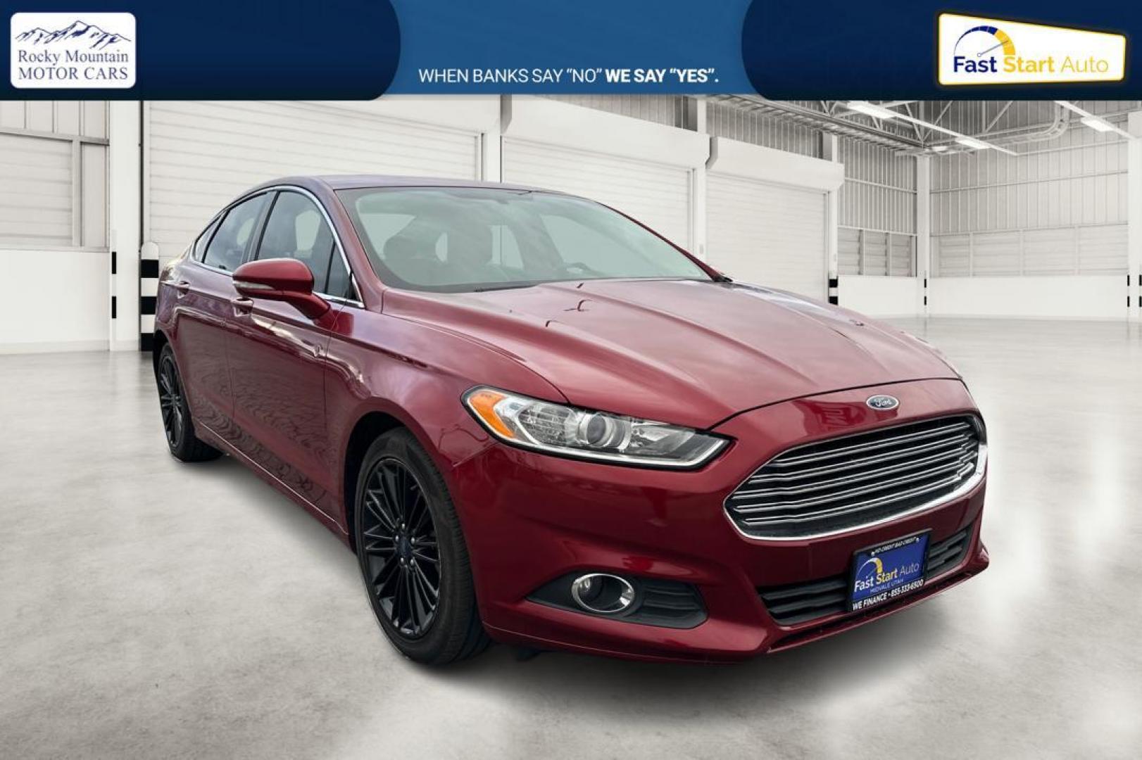 2016 Red Ford Fusion SE (1FA6P0HD4G5) with an 1.5L L4 DOHC 16V engine, 6-Speed Automatic transmission, located at 7755 State Street, Midvale, UT, 84047, (801) 753-9063, 40.610329, -111.890656 - Photo#0