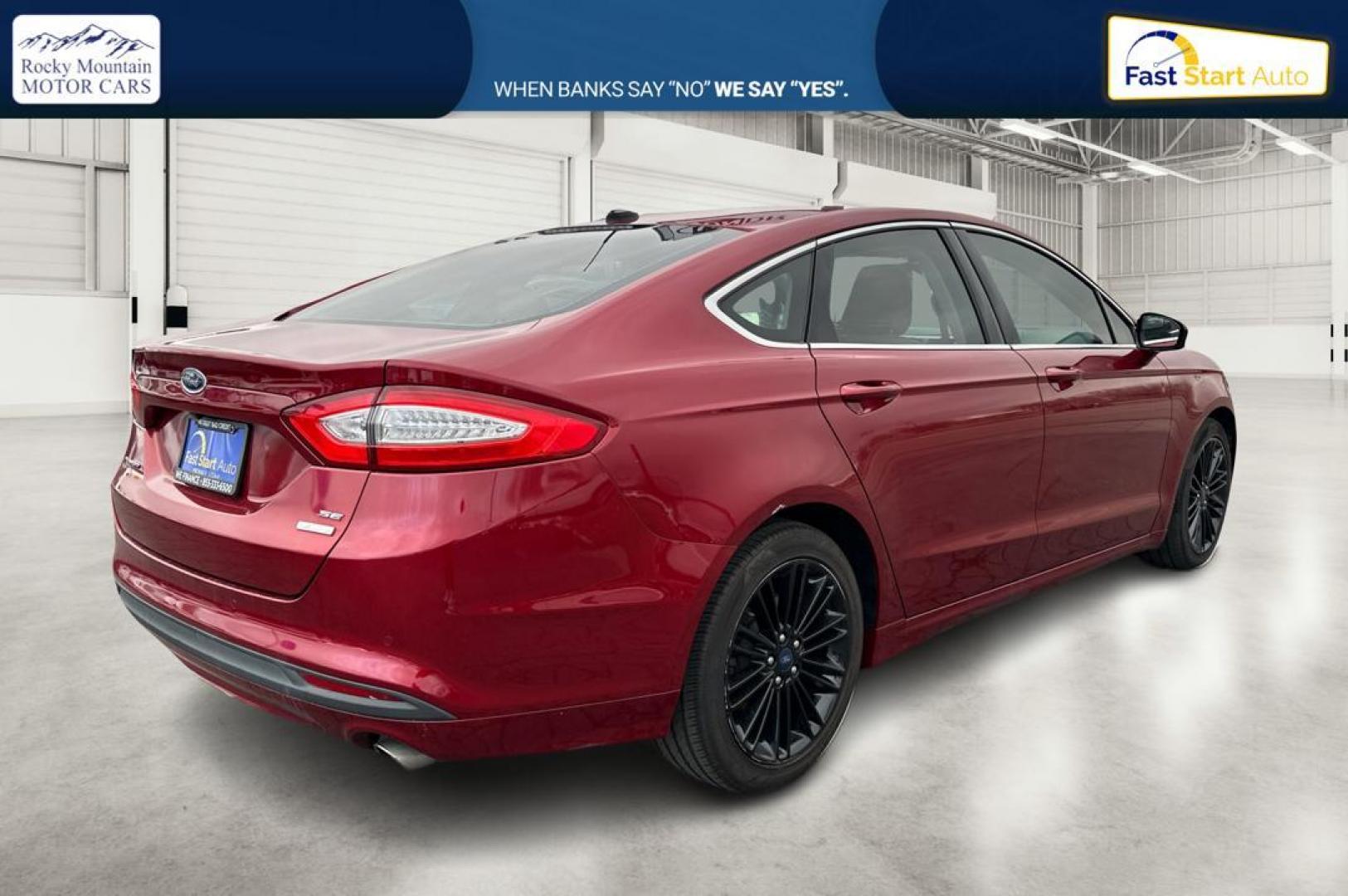 2016 Red Ford Fusion SE (1FA6P0HD4G5) with an 1.5L L4 DOHC 16V engine, 6-Speed Automatic transmission, located at 7755 State Street, Midvale, UT, 84047, (801) 753-9063, 40.610329, -111.890656 - Photo#2