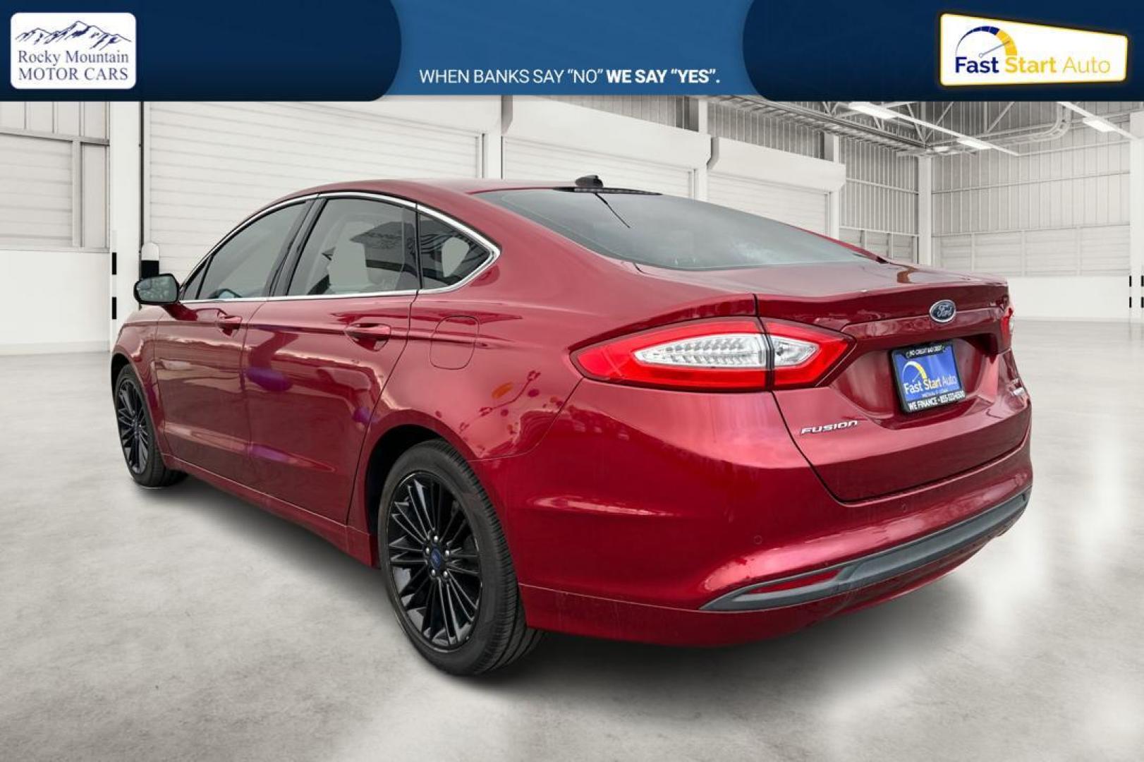 2016 Red Ford Fusion SE (1FA6P0HD4G5) with an 1.5L L4 DOHC 16V engine, 6-Speed Automatic transmission, located at 7755 State Street, Midvale, UT, 84047, (801) 753-9063, 40.610329, -111.890656 - Photo#5