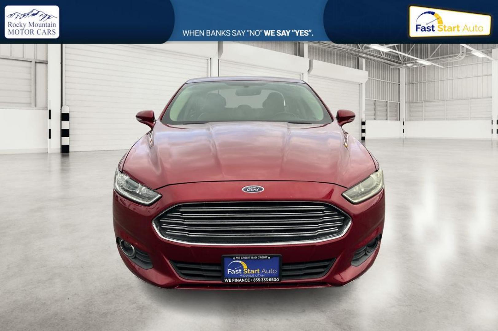 2016 Red Ford Fusion SE (1FA6P0HD4G5) with an 1.5L L4 DOHC 16V engine, 6-Speed Automatic transmission, located at 7755 State Street, Midvale, UT, 84047, (801) 753-9063, 40.610329, -111.890656 - Photo#9