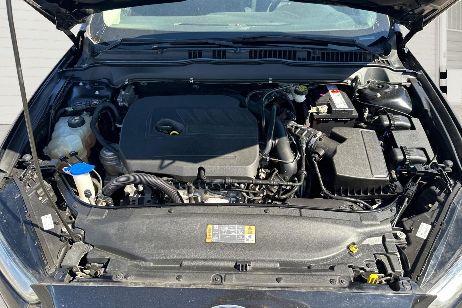 2016 Black Ford Fusion SE (3FA6P0HD8GR) with an 1.5L L4 DOHC 16V engine, 6-Speed Automatic transmission, located at 7755 State Street, Midvale, UT, 84047, (801) 753-9063, 40.610329, -111.890656 - Photo#8