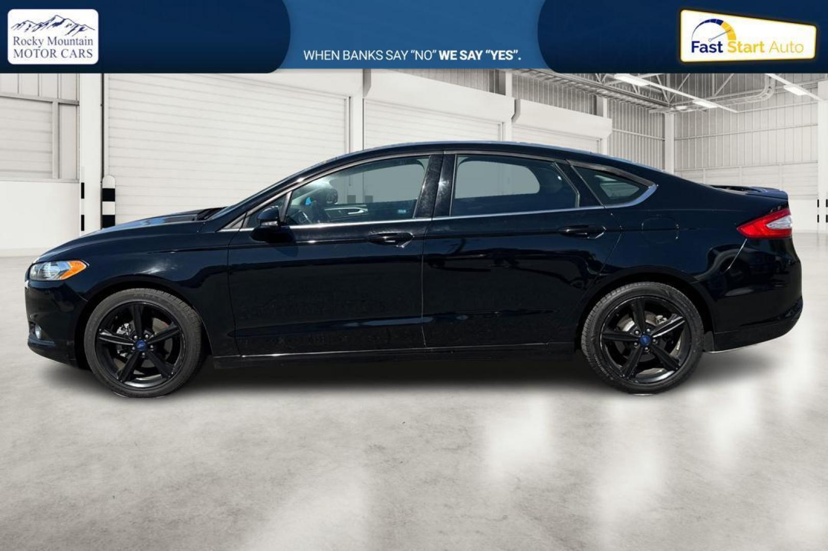 2016 Black Ford Fusion SE (3FA6P0HD8GR) with an 1.5L L4 DOHC 16V engine, 6-Speed Automatic transmission, located at 7755 State Street, Midvale, UT, 84047, (801) 753-9063, 40.610329, -111.890656 - Photo#5