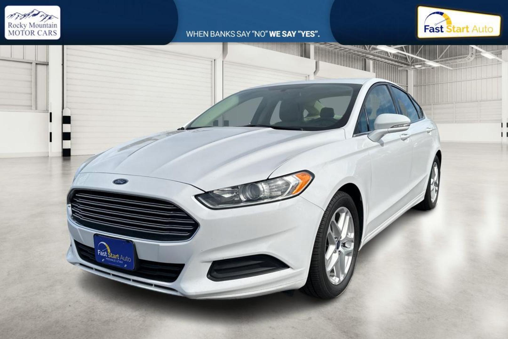 2016 White Ford Fusion SE (3FA6P0H77GR) with an 2.5L L4 DOHC 16V engine, 6-Speed Automatic transmission, located at 7755 State Street, Midvale, UT, 84047, (801) 753-9063, 40.610329, -111.890656 - Photo#8