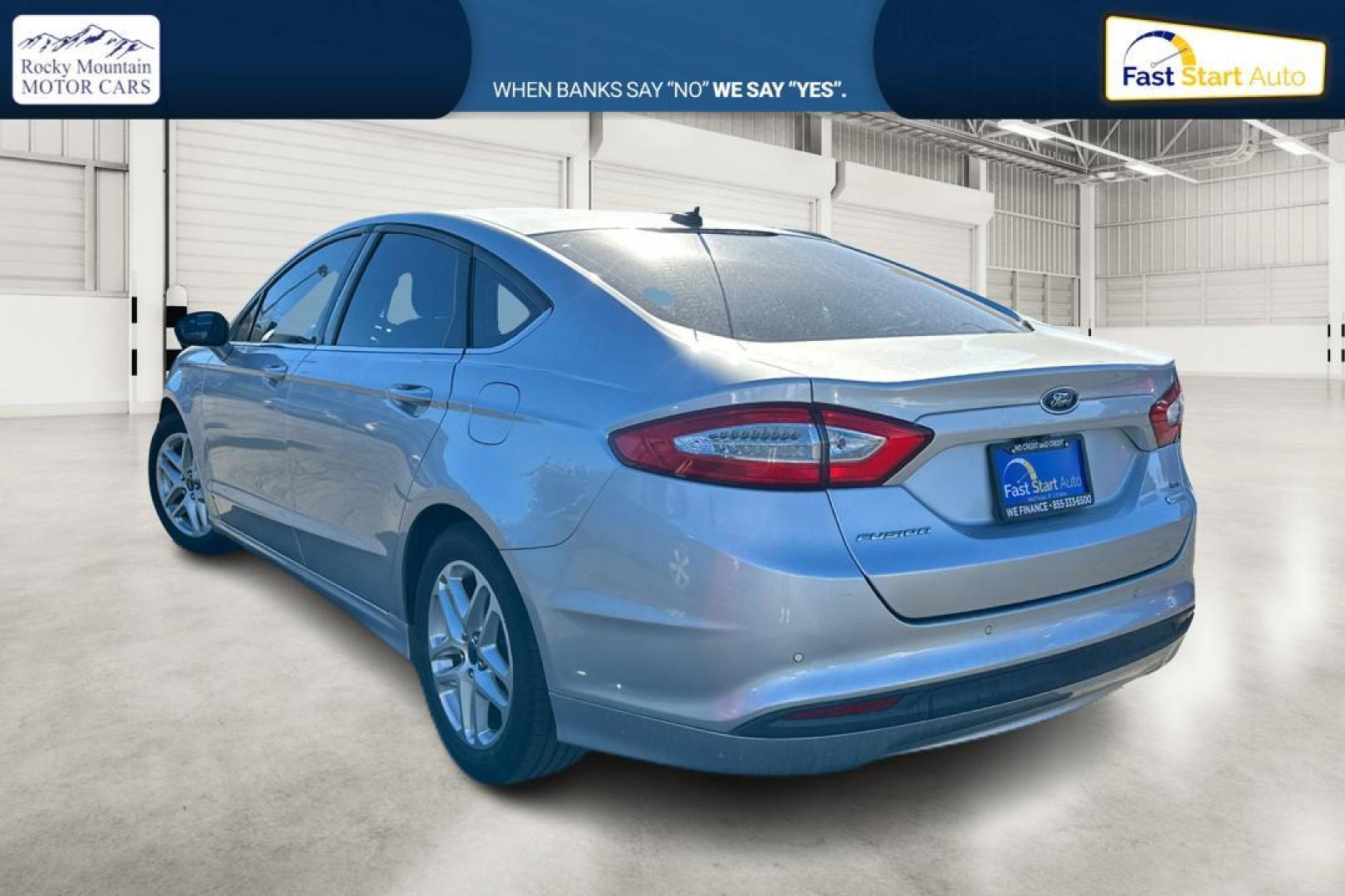 2016 Silver Ford Fusion SE (3FA6P0HD4GR) with an 1.5L L4 DOHC 16V engine, 6-Speed Automatic transmission, located at 344 S Washington Blvd, Ogden, UT, 84404, (801) 399-1799, 41.255482, -111.970848 - Photo#4