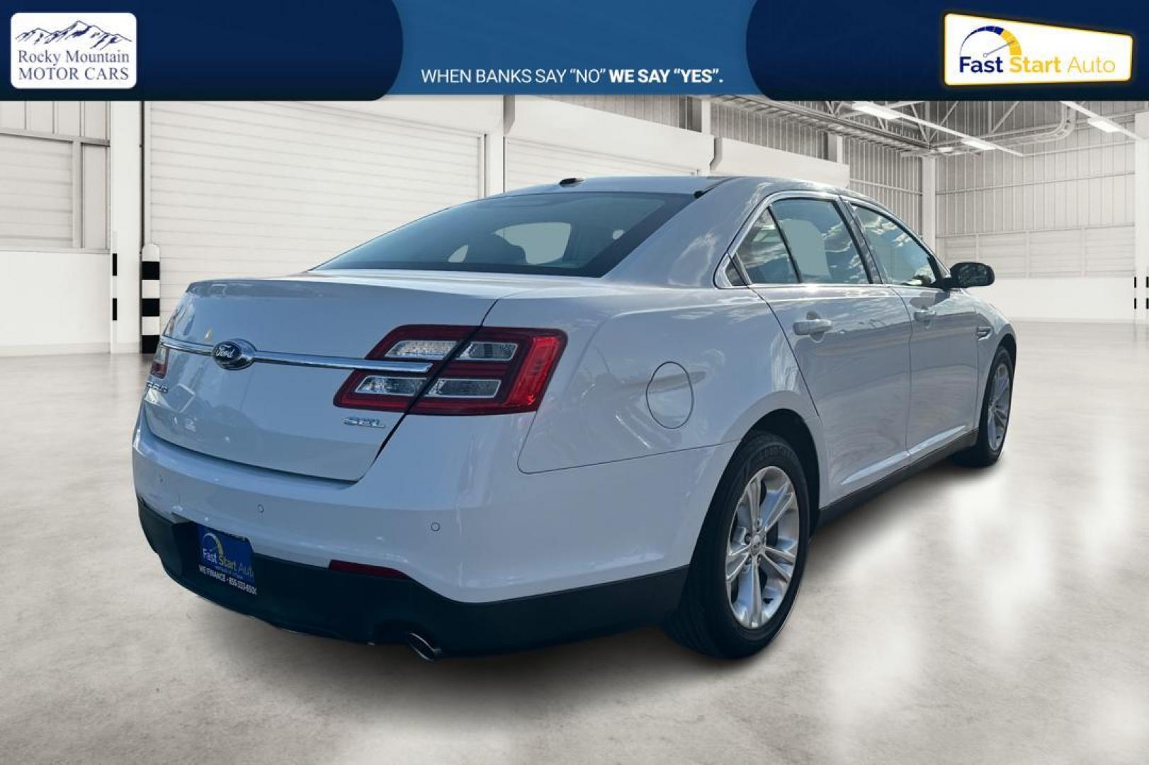 2016 White Ford Taurus SEL FWD (1FAHP2E83GG) with an 3.5L V6 DOHC 24V engine, 6A transmission, located at 7755 State Street, Midvale, UT, 84047, (801) 753-9063, 40.610329, -111.890656 - Photo#2