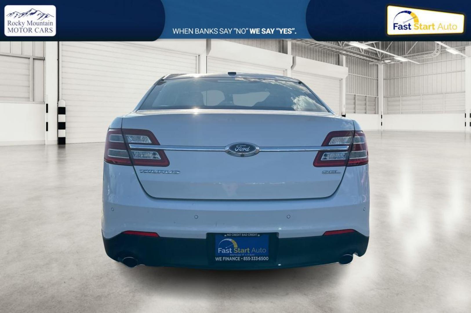 2016 White Ford Taurus SEL FWD (1FAHP2E83GG) with an 3.5L V6 DOHC 24V engine, 6A transmission, located at 7755 State Street, Midvale, UT, 84047, (801) 753-9063, 40.610329, -111.890656 - Photo#4