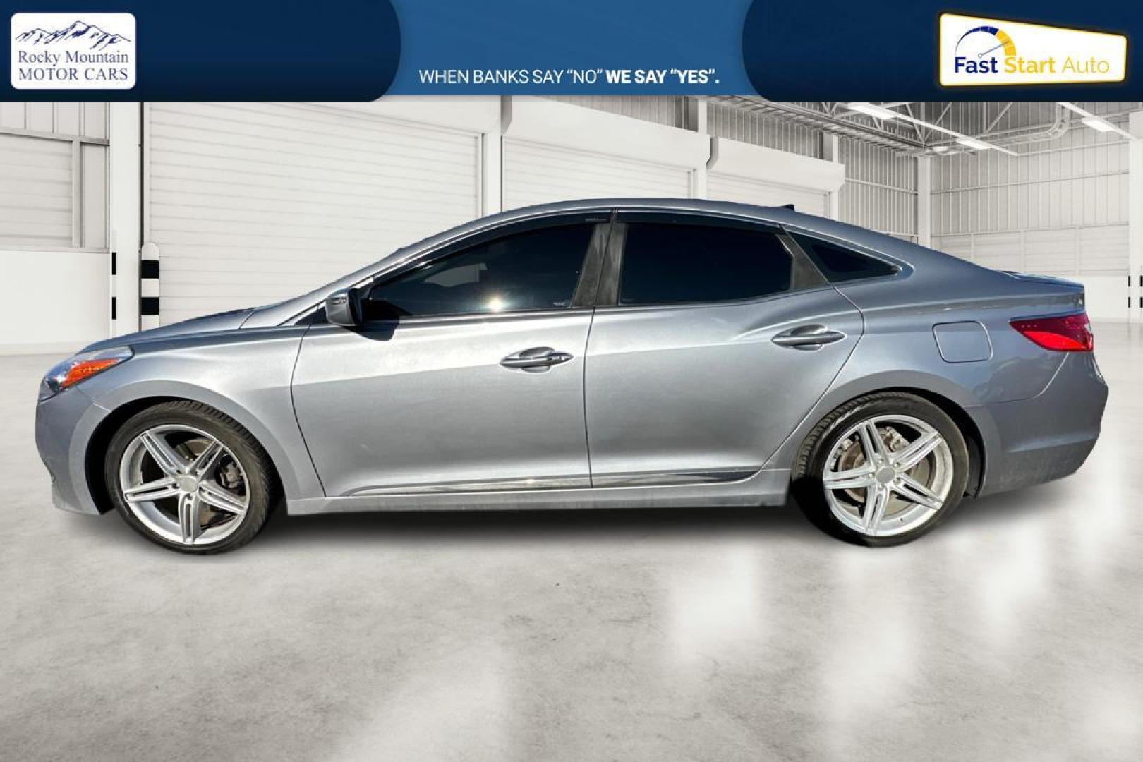 2016 Gray Hyundai Azera Limited (KMHFH4JG3GA) with an 3.3L V6 DOHC 24V engine, 6A transmission, located at 7755 State Street, Midvale, UT, 84047, (801) 753-9063, 40.610329, -111.890656 - Photo#6