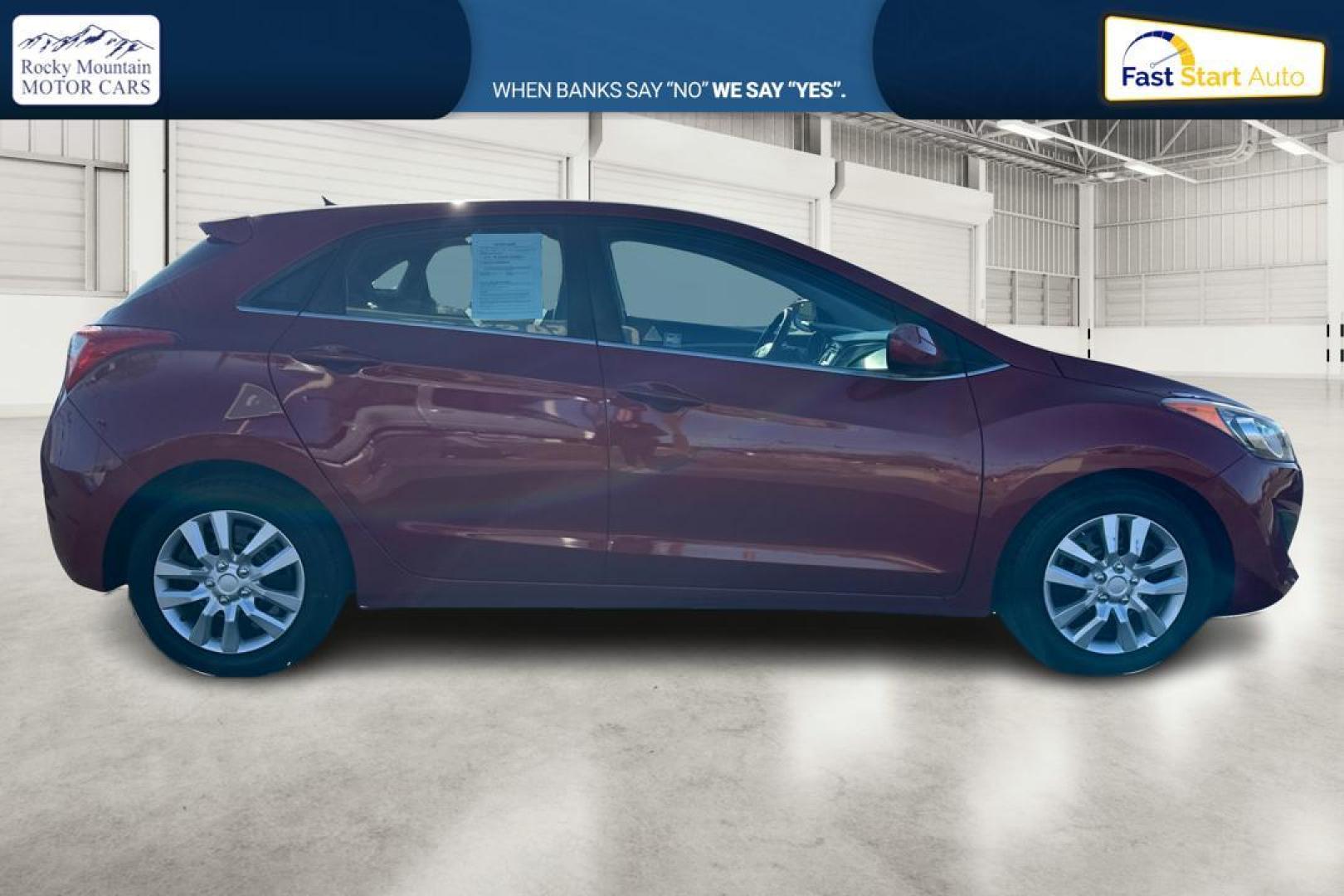 2016 Red Hyundai Elantra GT A/T (KMHD35LH0GU) with an 2.0L L4 16V DOHC engine, 6A transmission, located at 344 S Washington Blvd, Ogden, UT, 84404, (801) 399-1799, 41.255482, -111.970848 - Photo#1
