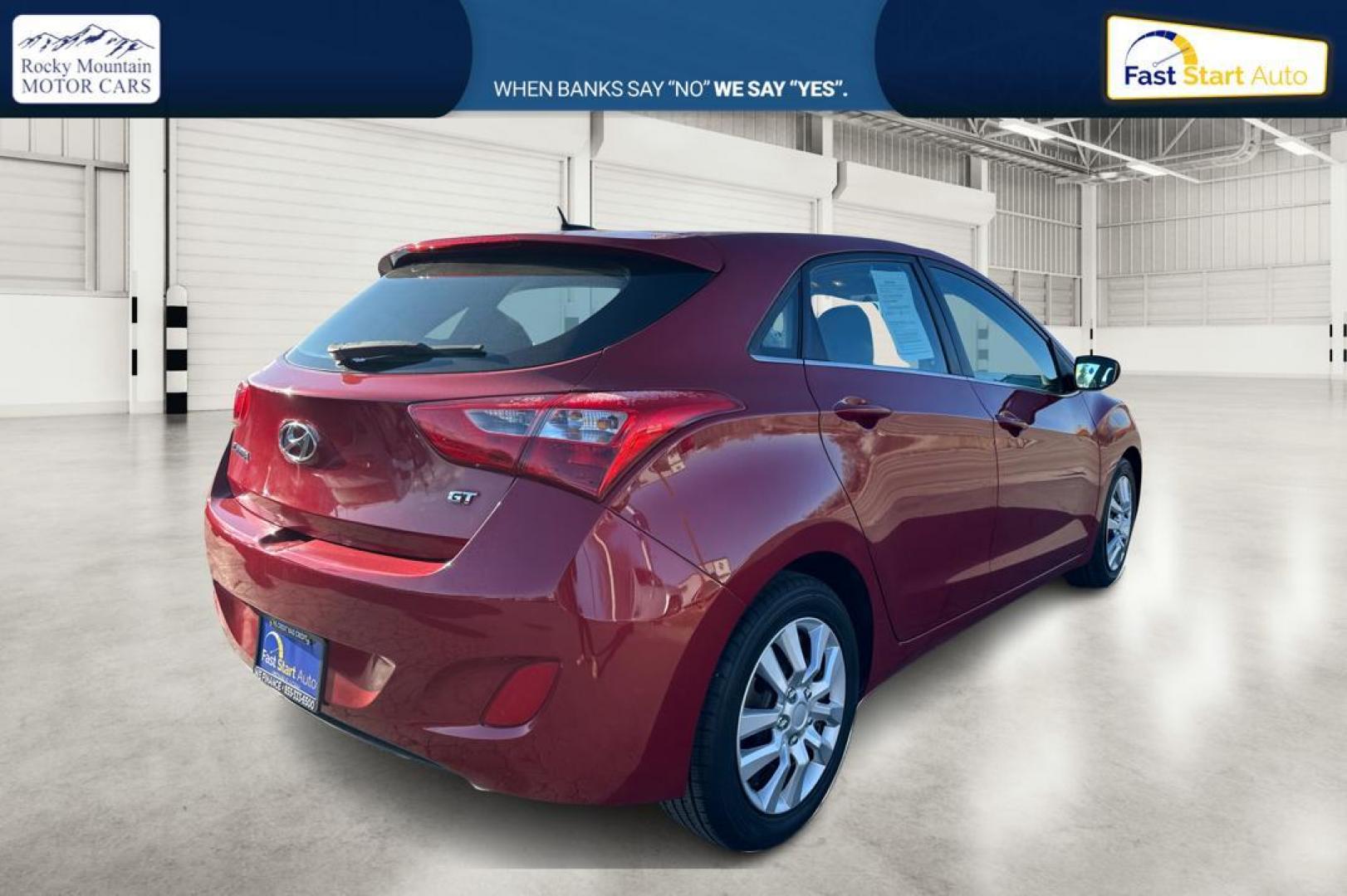 2016 Red Hyundai Elantra GT A/T (KMHD35LH0GU) with an 2.0L L4 16V DOHC engine, 6A transmission, located at 344 S Washington Blvd, Ogden, UT, 84404, (801) 399-1799, 41.255482, -111.970848 - Photo#2