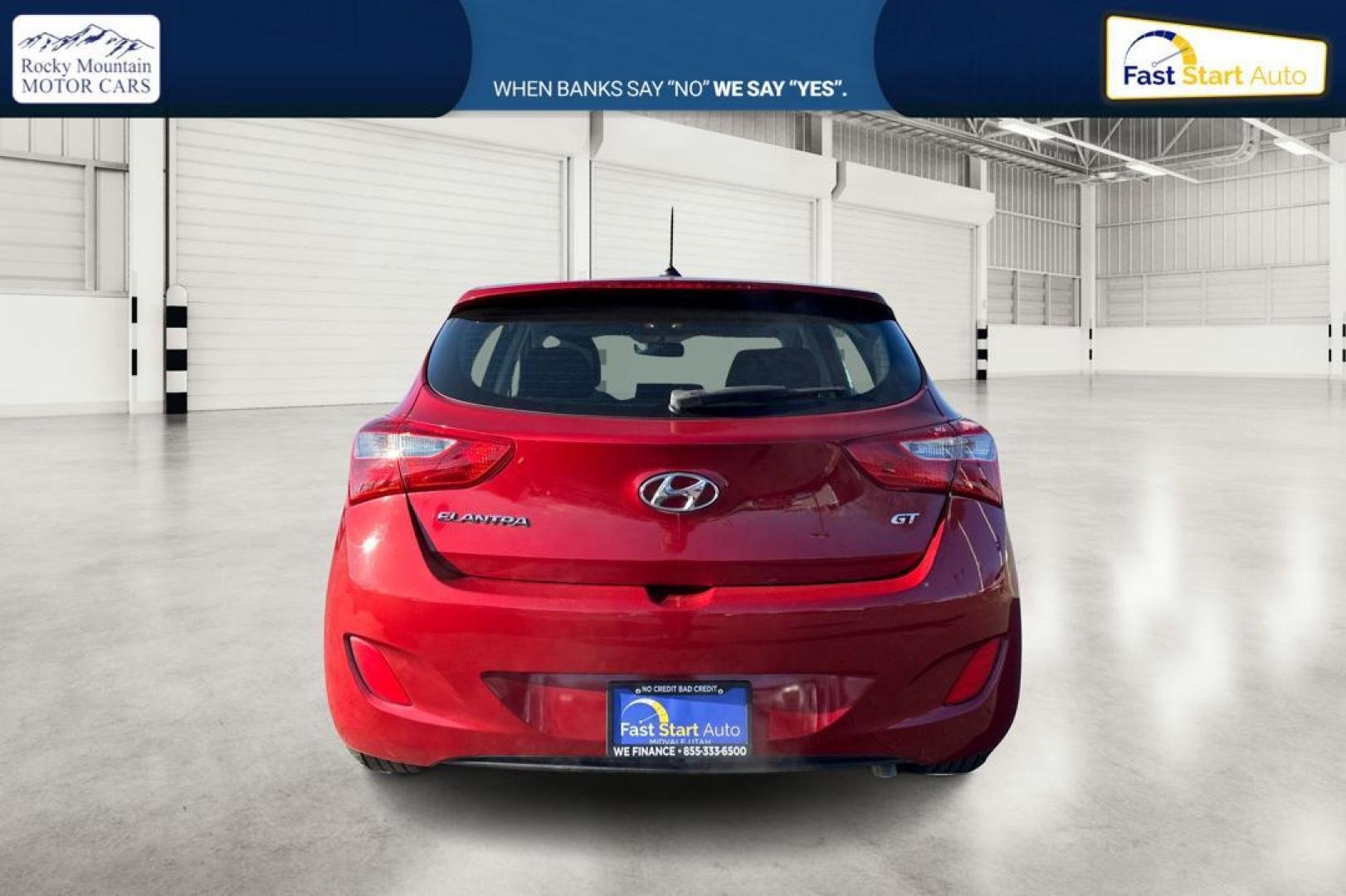 2016 Red Hyundai Elantra GT A/T (KMHD35LH0GU) with an 2.0L L4 16V DOHC engine, 6A transmission, located at 344 S Washington Blvd, Ogden, UT, 84404, (801) 399-1799, 41.255482, -111.970848 - Photo#4