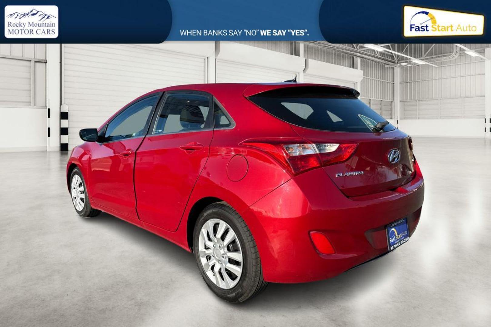2016 Red Hyundai Elantra GT A/T (KMHD35LH0GU) with an 2.0L L4 16V DOHC engine, 6A transmission, located at 344 S Washington Blvd, Ogden, UT, 84404, (801) 399-1799, 41.255482, -111.970848 - Photo#5