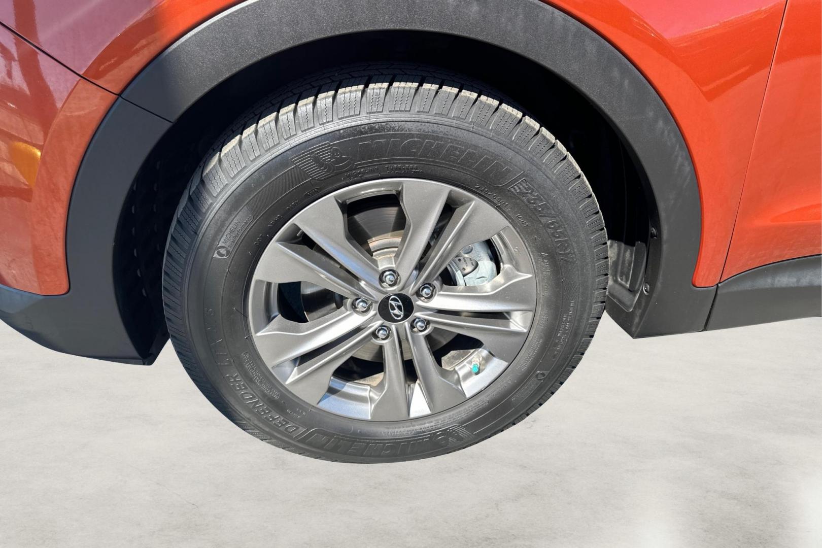 2016 Orange Hyundai Santa Fe Sport 2.4 FWD (5XYZT3LB5GG) with an 2.4L L4 DOHC 16V engine, 6-Speed Automatic transmission, located at 7755 State Street, Midvale, UT, 84047, (801) 753-9063, 40.610329, -111.890656 - Photo#12