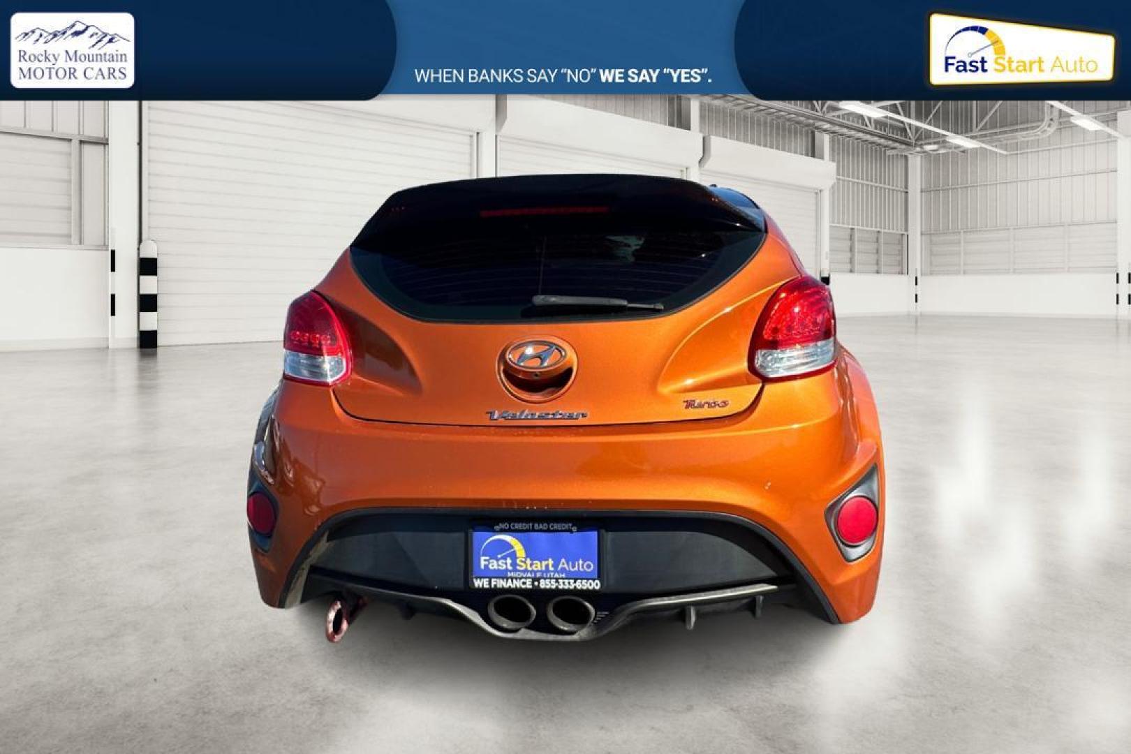 2016 Orange Hyundai Veloster Turbo 6MT (KMHTC6AE4GU) with an 1.6L L4 DOHC 16V TURBO engine, 6M transmission, located at 7755 State Street, Midvale, UT, 84047, (801) 753-9063, 40.610329, -111.890656 - Photo#4
