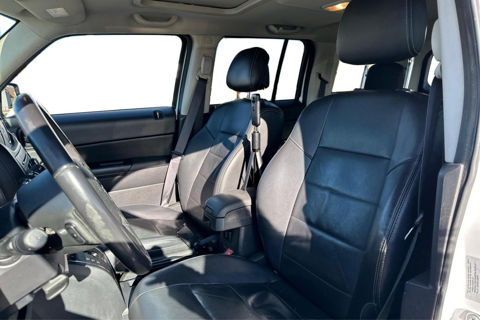 2016 White Jeep Patriot Latitude 4WD (1C4NJRFB3GD) with an 2.4L L4 DOHC 16V engine, Automatic, CVT transmission, located at 7755 State Street, Midvale, UT, 84047, (801) 753-9063, 40.610329, -111.890656 - Photo#14