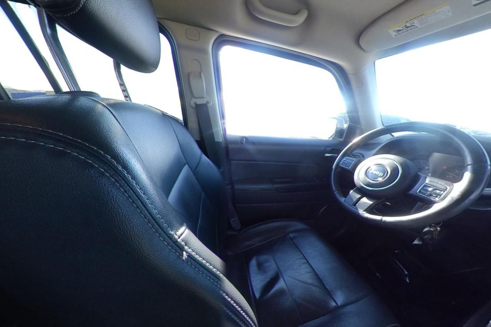 2016 White Jeep Patriot Latitude 4WD (1C4NJRFB3GD) with an 2.4L L4 DOHC 16V engine, Automatic, CVT transmission, located at 7755 State Street, Midvale, UT, 84047, (801) 753-9063, 40.610329, -111.890656 - Photo#19