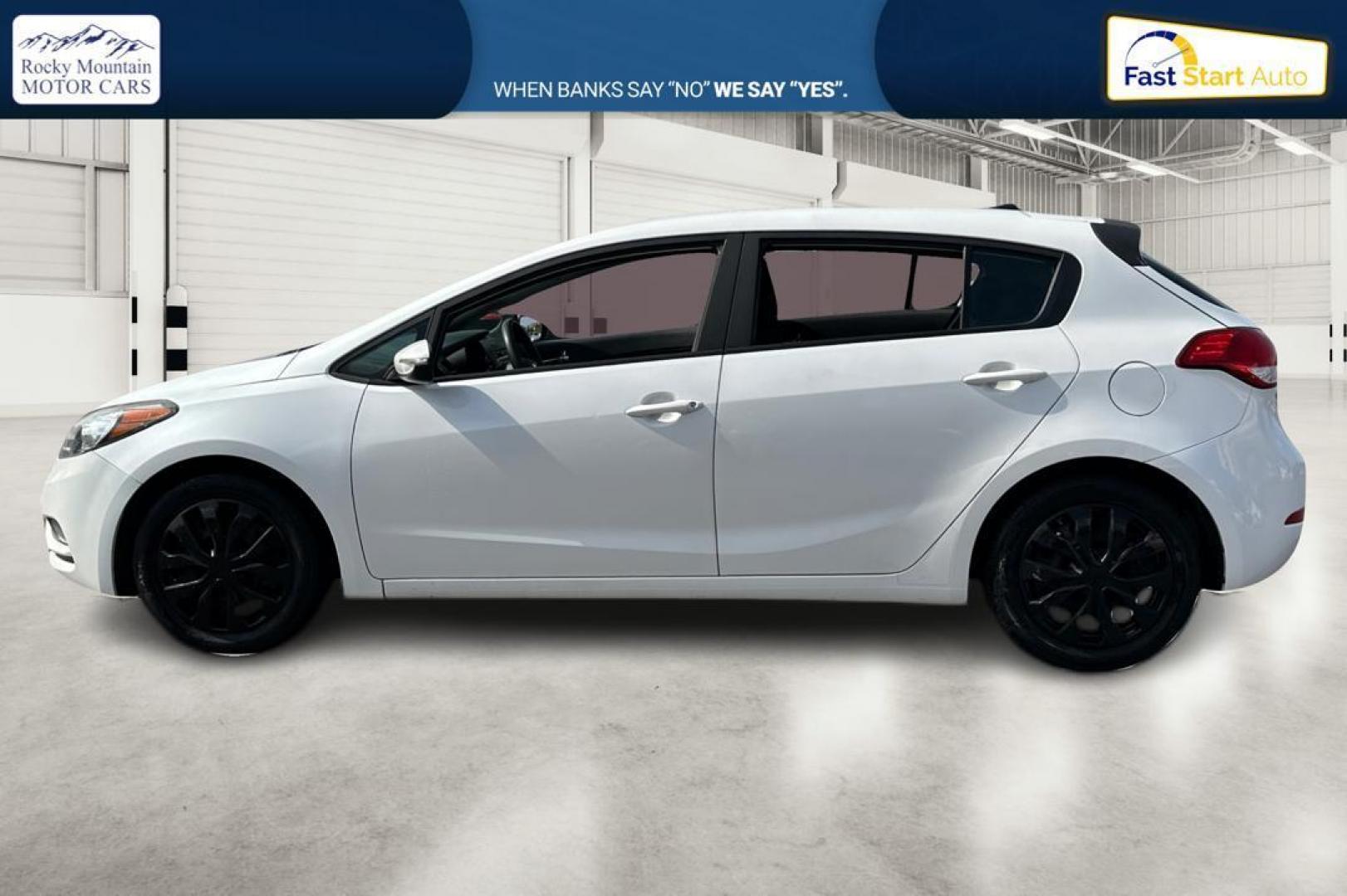 2016 White Kia Forte 5-Door LX (KNAFK5A84G5) with an 2.0L L4 DOHC 16V engine, 6-Speed Automatic transmission, located at 7755 State Street, Midvale, UT, 84047, (801) 753-9063, 40.610329, -111.890656 - Photo#6