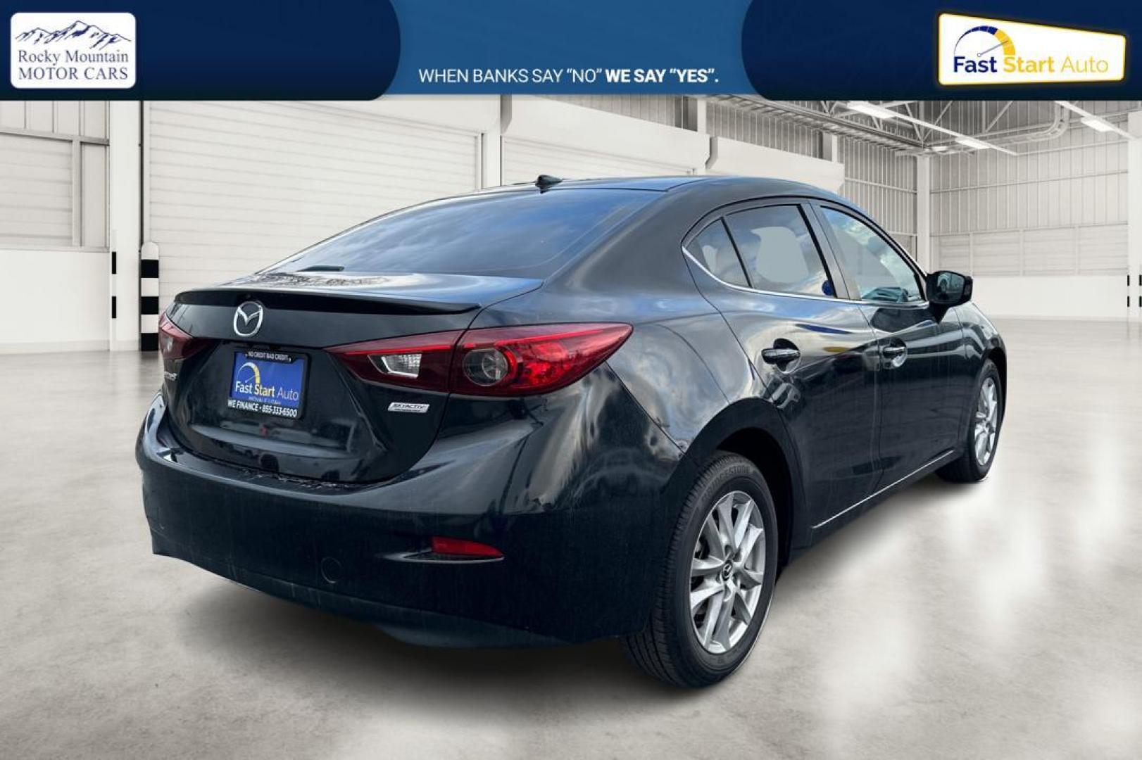 2016 Black Mazda MAZDA3 i Grand Touring MT 4-Door (JM1BM1W79G1) with an 2.0L L4 DOHC 16V engine, 6M transmission, located at 7755 State Street, Midvale, UT, 84047, (801) 753-9063, 40.610329, -111.890656 - Photo#2