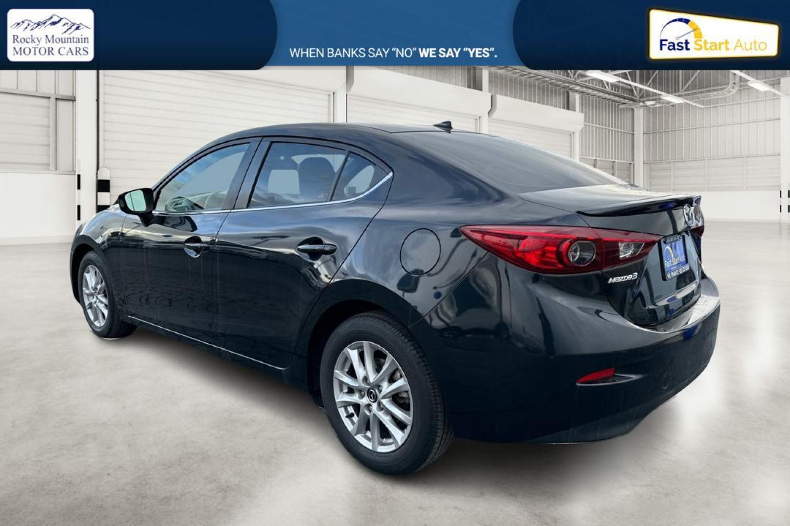 2016 Black Mazda MAZDA3 i Grand Touring MT 4-Door (JM1BM1W79G1) with an 2.0L L4 DOHC 16V engine, 6M transmission, located at 7755 State Street, Midvale, UT, 84047, (801) 753-9063, 40.610329, -111.890656 - Photo#5