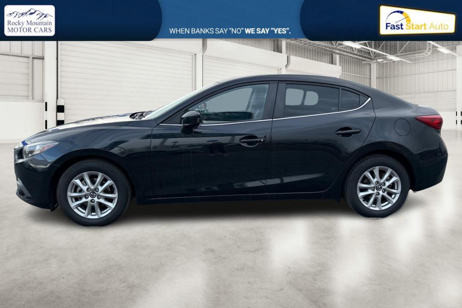 2016 Black Mazda MAZDA3 i Grand Touring MT 4-Door (JM1BM1W79G1) with an 2.0L L4 DOHC 16V engine, 6M transmission, located at 7755 State Street, Midvale, UT, 84047, (801) 753-9063, 40.610329, -111.890656 - Photo#6