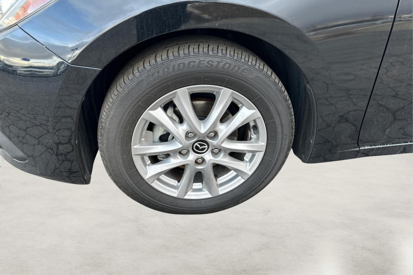 2016 Black Mazda MAZDA3 i Grand Touring MT 4-Door (JM1BM1W79G1) with an 2.0L L4 DOHC 16V engine, 6M transmission, located at 7755 State Street, Midvale, UT, 84047, (801) 753-9063, 40.610329, -111.890656 - Photo#12