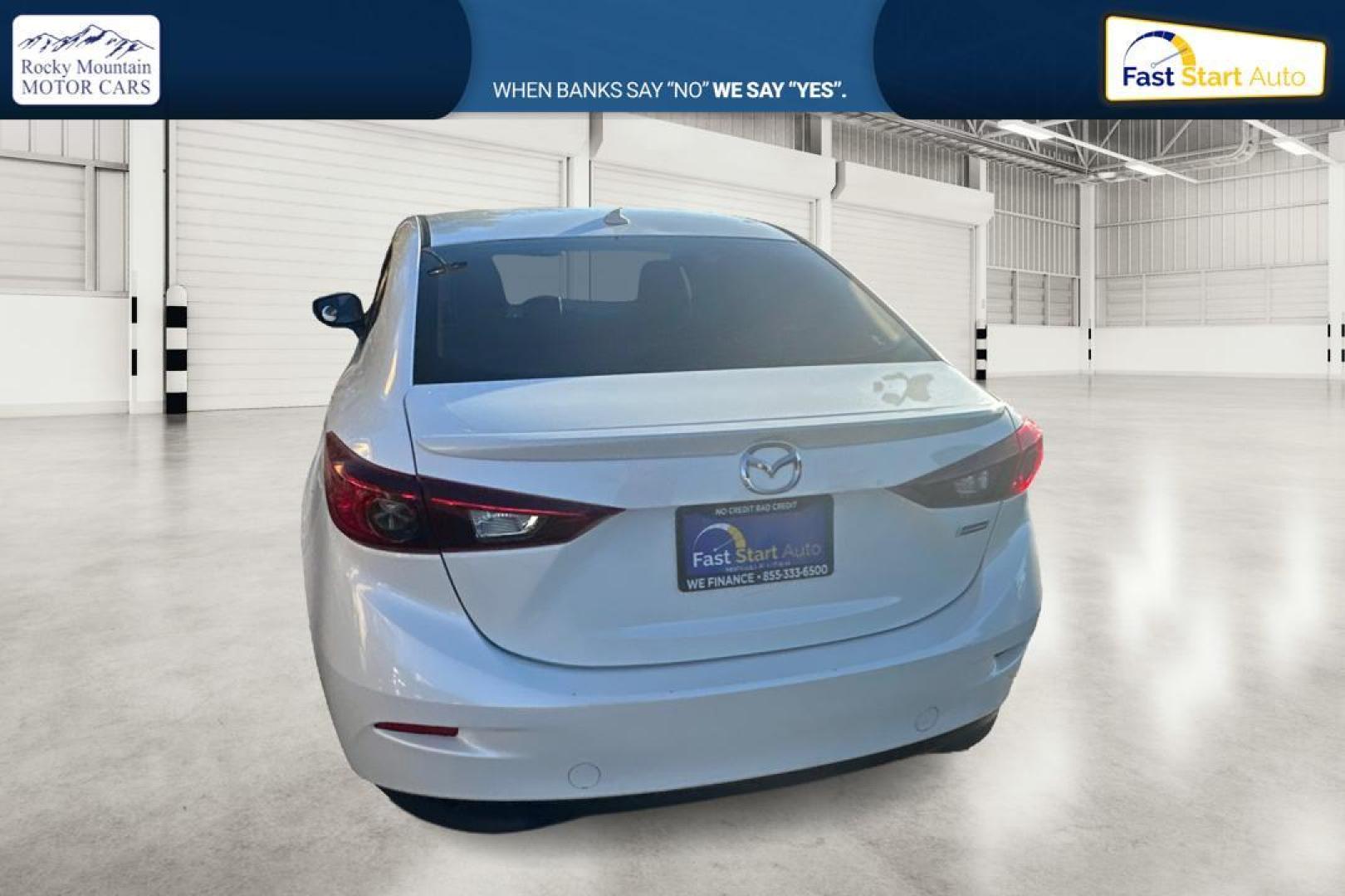2016 White Mazda MAZDA3 i SE AT 4-Door (JM1BM1X79G1) with an 2.0L L4 DOHC 16V engine, 6A transmission, located at 7755 State Street, Midvale, UT, 84047, (801) 753-9063, 40.610329, -111.890656 - Photo#4