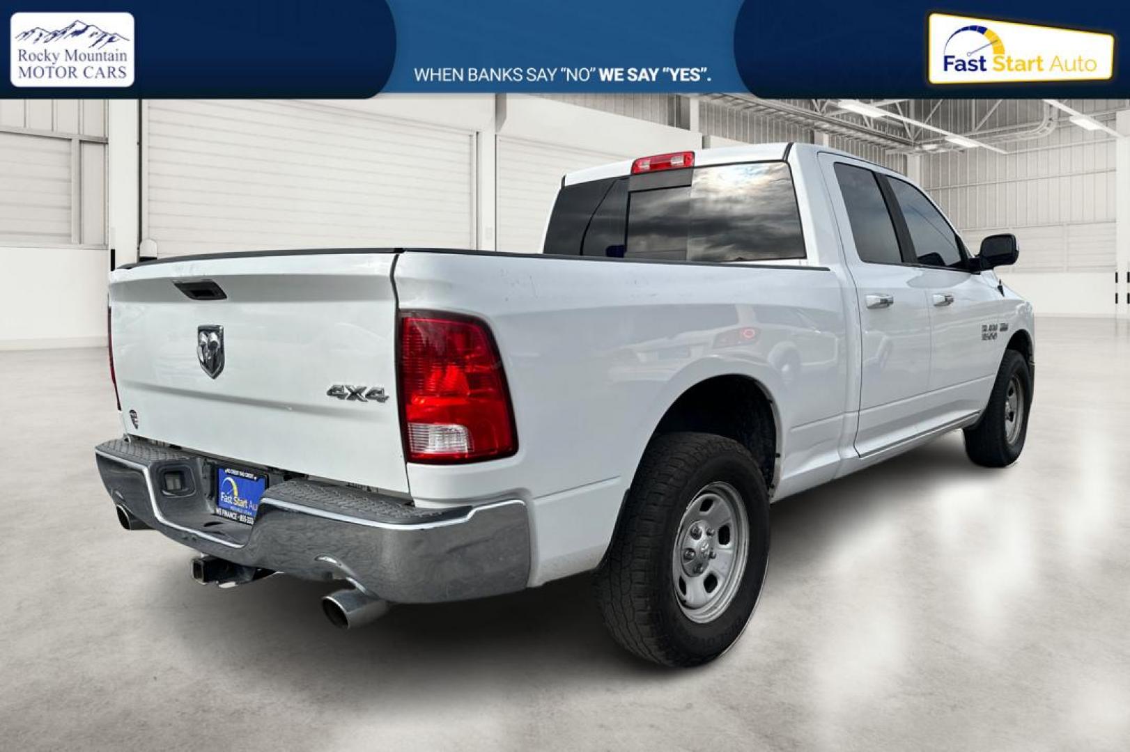 2016 White RAM 1500 SLT Quad Cab 4WD (1C6RR7GTXGS) with an 5.7L V8 OHV 16V engine, 6A transmission, located at 7755 State Street, Midvale, UT, 84047, (801) 753-9063, 40.610329, -111.890656 - Photo#2