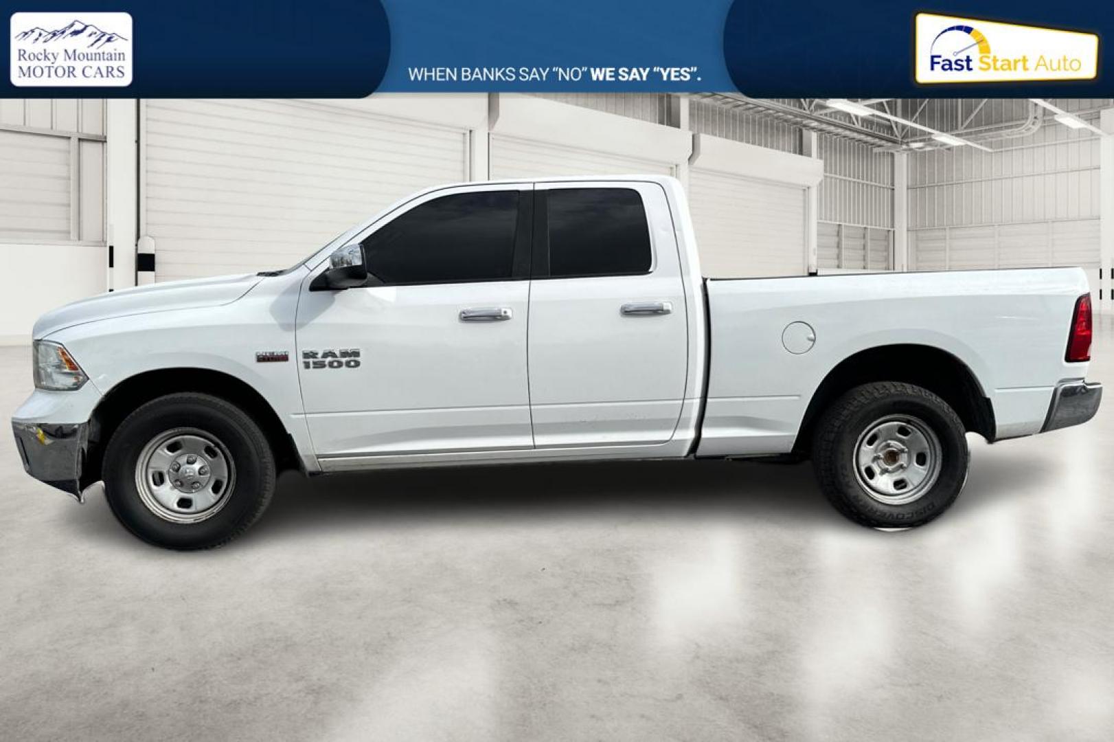 2016 White RAM 1500 SLT Quad Cab 4WD (1C6RR7GTXGS) with an 5.7L V8 OHV 16V engine, 6A transmission, located at 7755 State Street, Midvale, UT, 84047, (801) 753-9063, 40.610329, -111.890656 - Photo#6