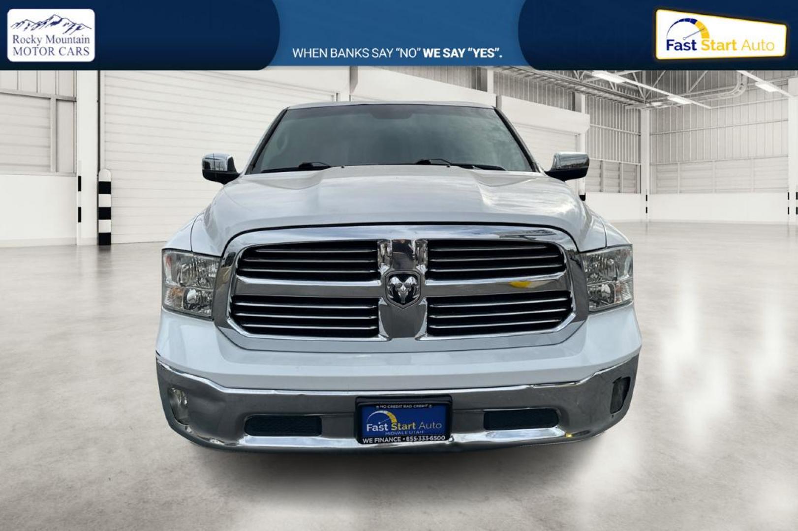 2016 White RAM 1500 SLT Quad Cab 4WD (1C6RR7GTXGS) with an 5.7L V8 OHV 16V engine, 6A transmission, located at 7755 State Street, Midvale, UT, 84047, (801) 753-9063, 40.610329, -111.890656 - Photo#9