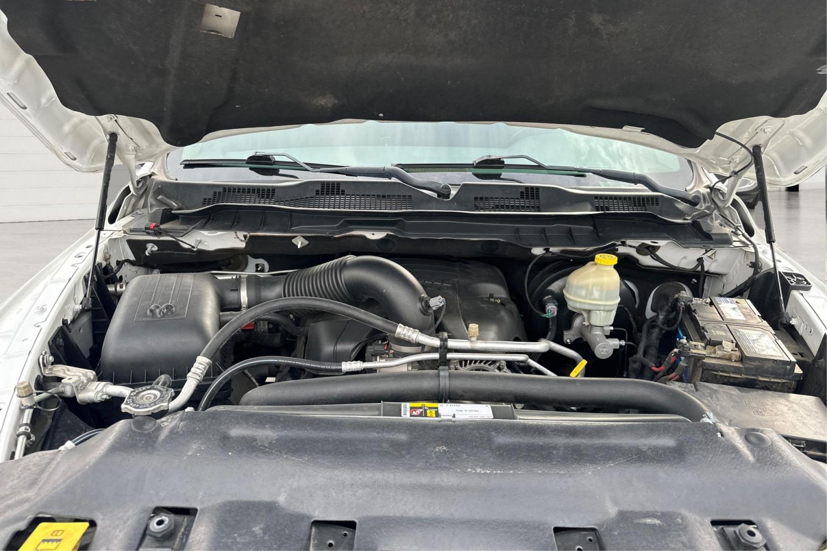 2016 White RAM 1500 SLT Quad Cab 4WD (1C6RR7GTXGS) with an 5.7L V8 OHV 16V engine, 6A transmission, located at 7755 State Street, Midvale, UT, 84047, (801) 753-9063, 40.610329, -111.890656 - Photo#10