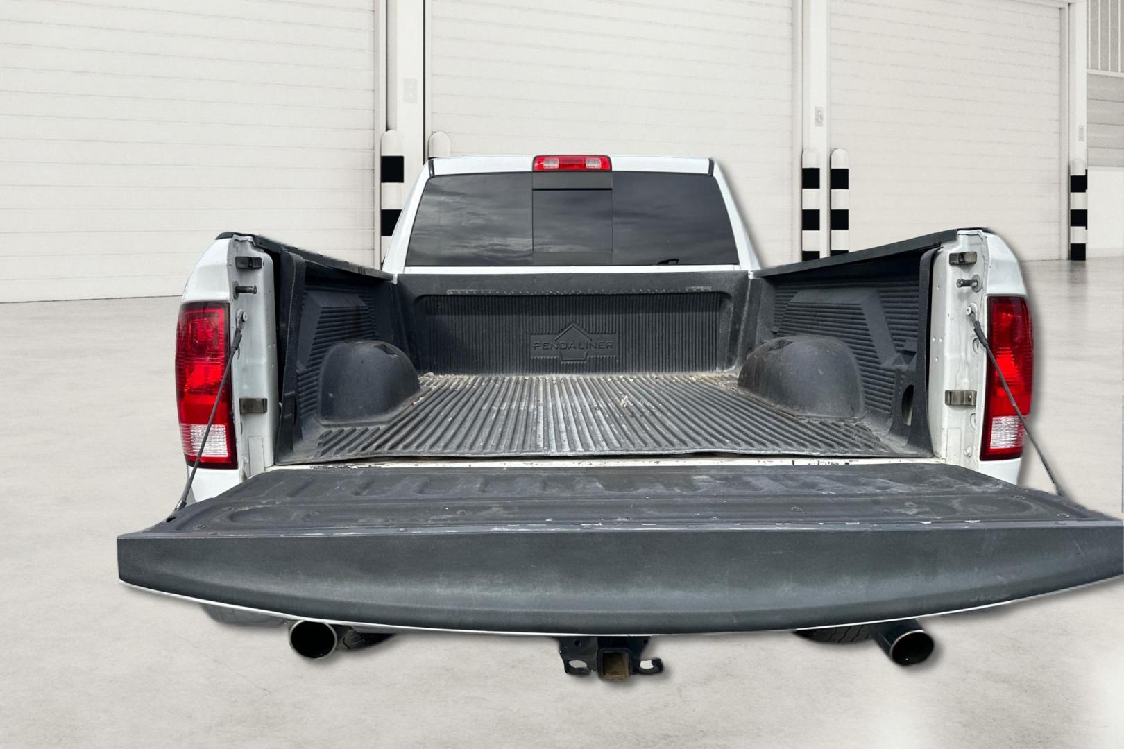 2016 White RAM 1500 SLT Quad Cab 4WD (1C6RR7GTXGS) with an 5.7L V8 OHV 16V engine, 6A transmission, located at 7755 State Street, Midvale, UT, 84047, (801) 753-9063, 40.610329, -111.890656 - Photo#13
