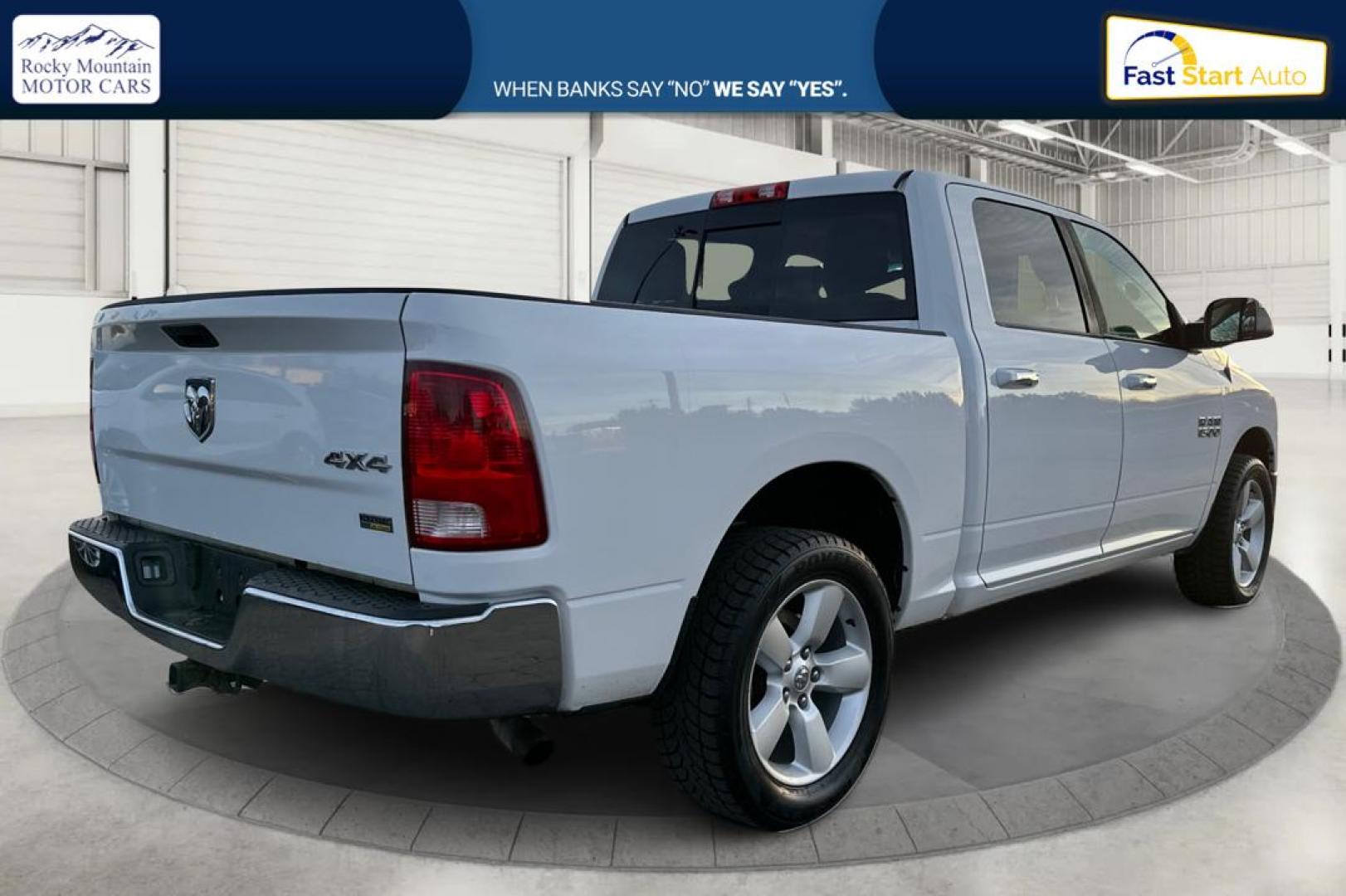 2016 White RAM 1500 SLT Crew Cab SWB 4WD (1C6RR7LG3GS) with an 3.6L V6 DOHC 24V FFV engine, 6A transmission, located at 767 S State Road, Pleasant Grove, UT, 84062, (801) 785-1058, 40.354839, -111.736687 - Photo#2