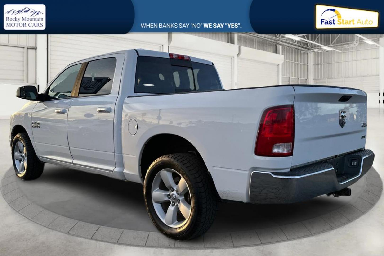 2016 White RAM 1500 SLT Crew Cab SWB 4WD (1C6RR7LG3GS) with an 3.6L V6 DOHC 24V FFV engine, 6A transmission, located at 767 S State Road, Pleasant Grove, UT, 84062, (801) 785-1058, 40.354839, -111.736687 - Photo#4